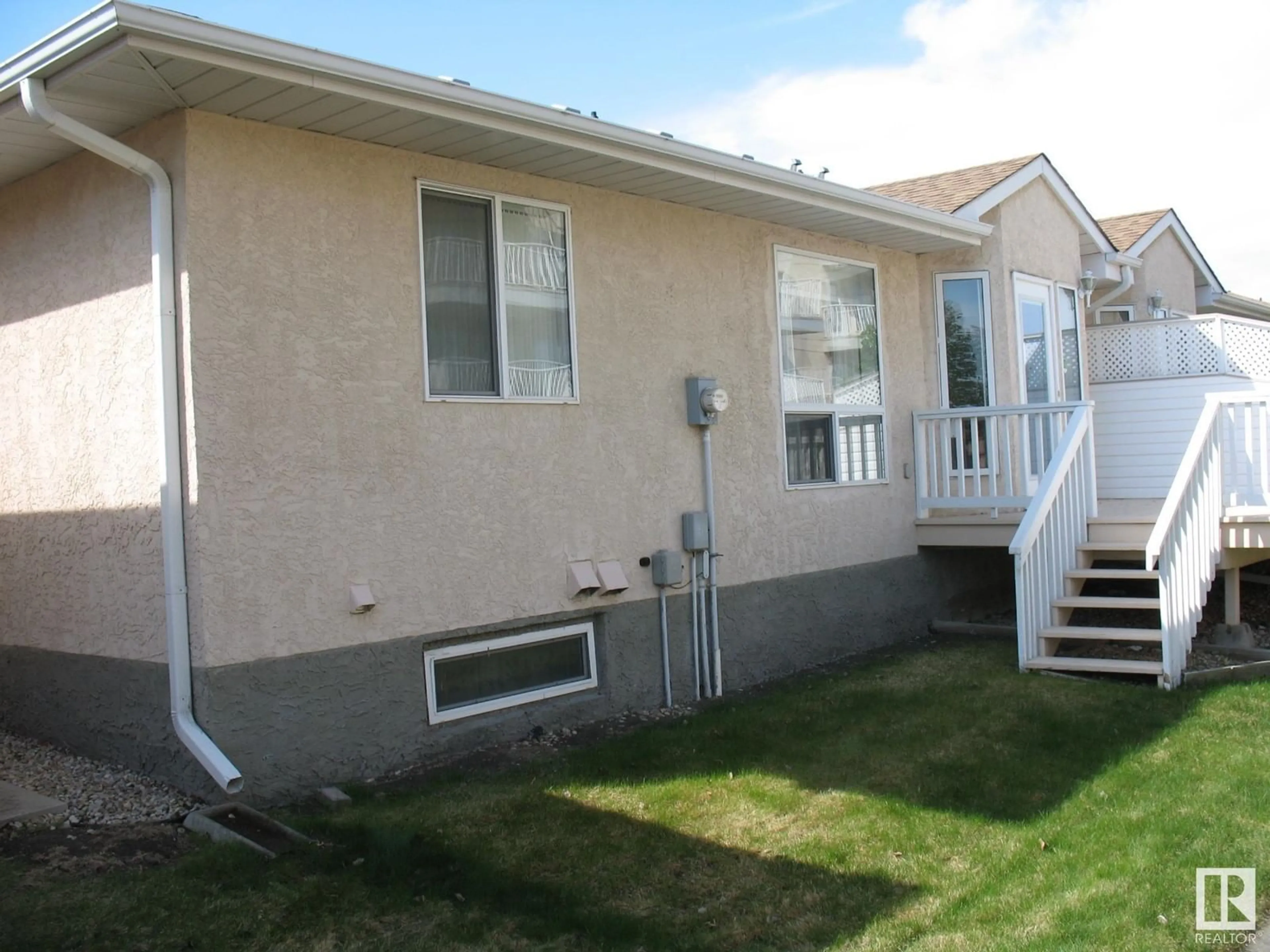 Home with vinyl exterior material, street for #88 - 13320 124 ST, Edmonton Alberta T5L5B7