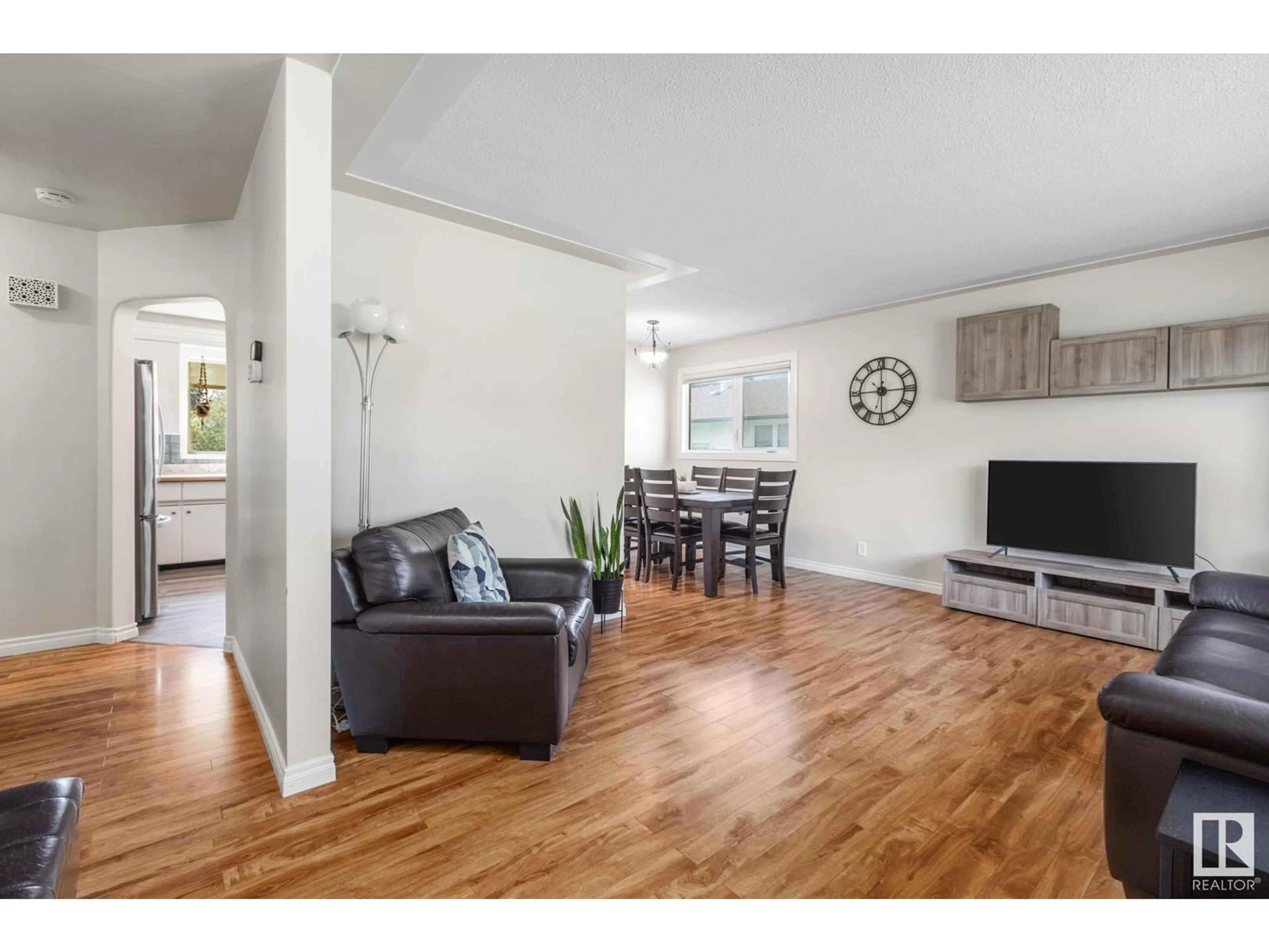 Living room with furniture, wood/laminate floor for 28 GRANDVILLE AV, St. Albert Alberta T8N0A9