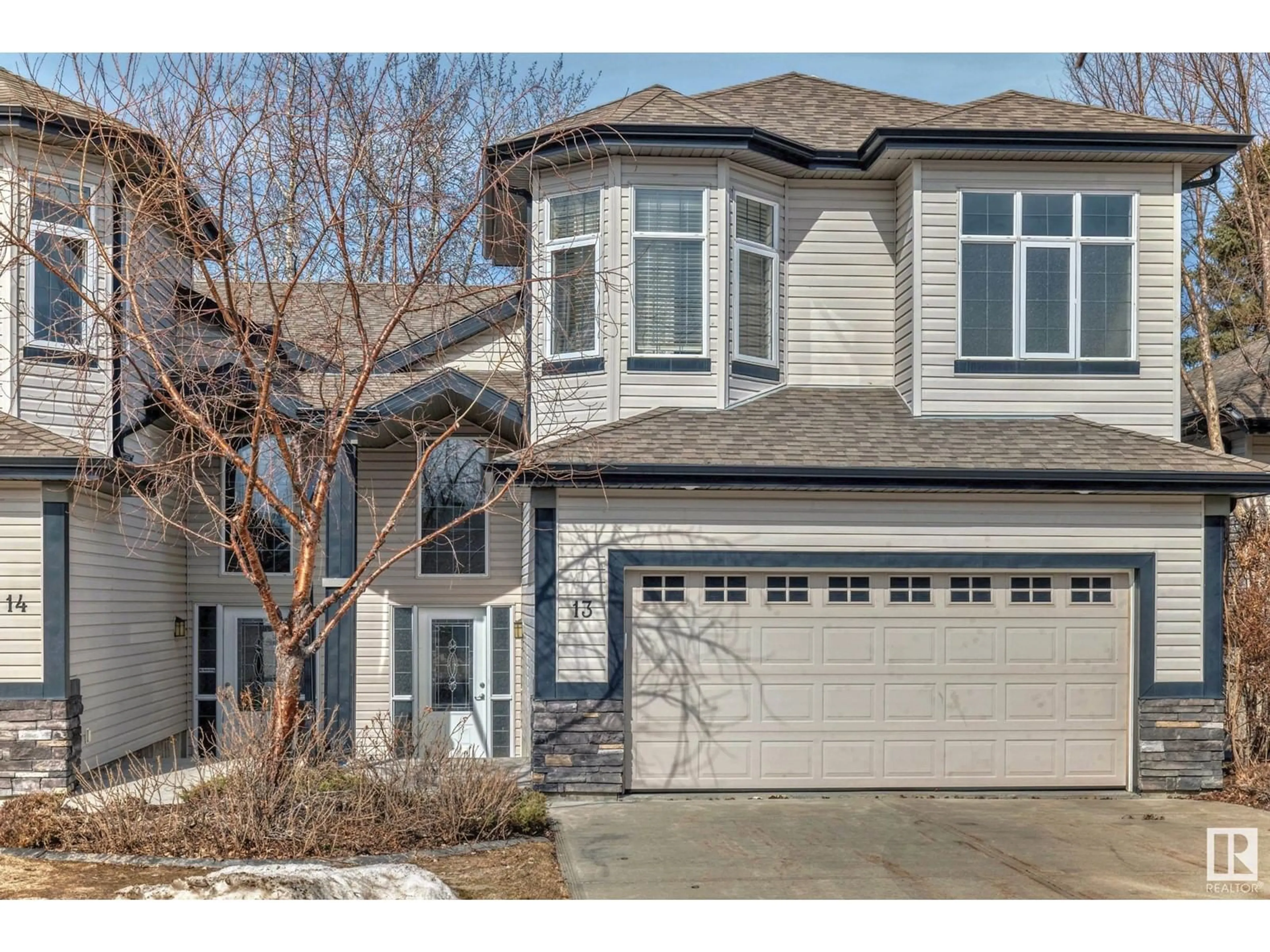Home with vinyl exterior material, street for #13 - 12610 15 AV, Edmonton Alberta T6W1X1