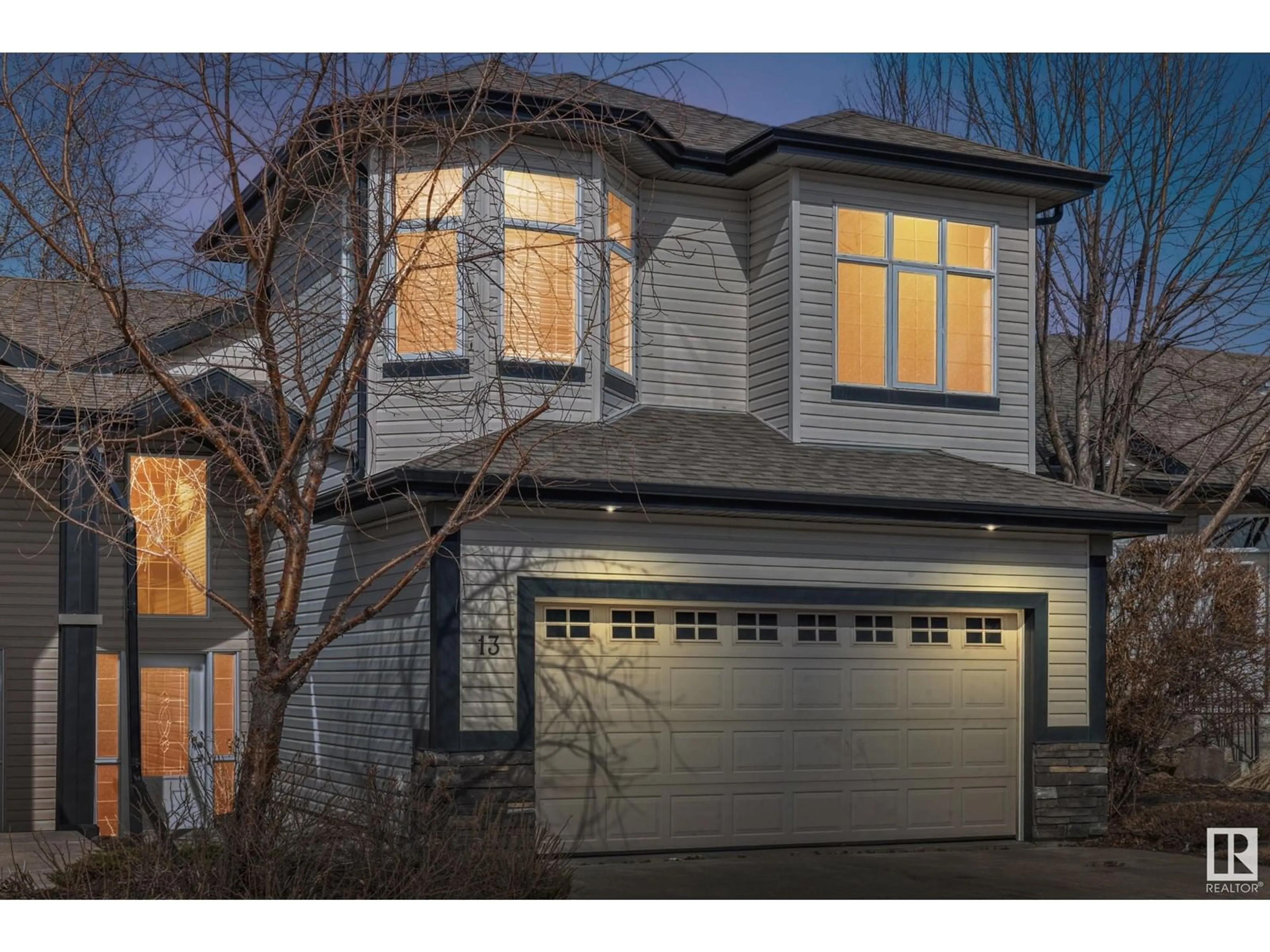 Home with vinyl exterior material, street for #13 - 12610 15 AV, Edmonton Alberta T6W1X1