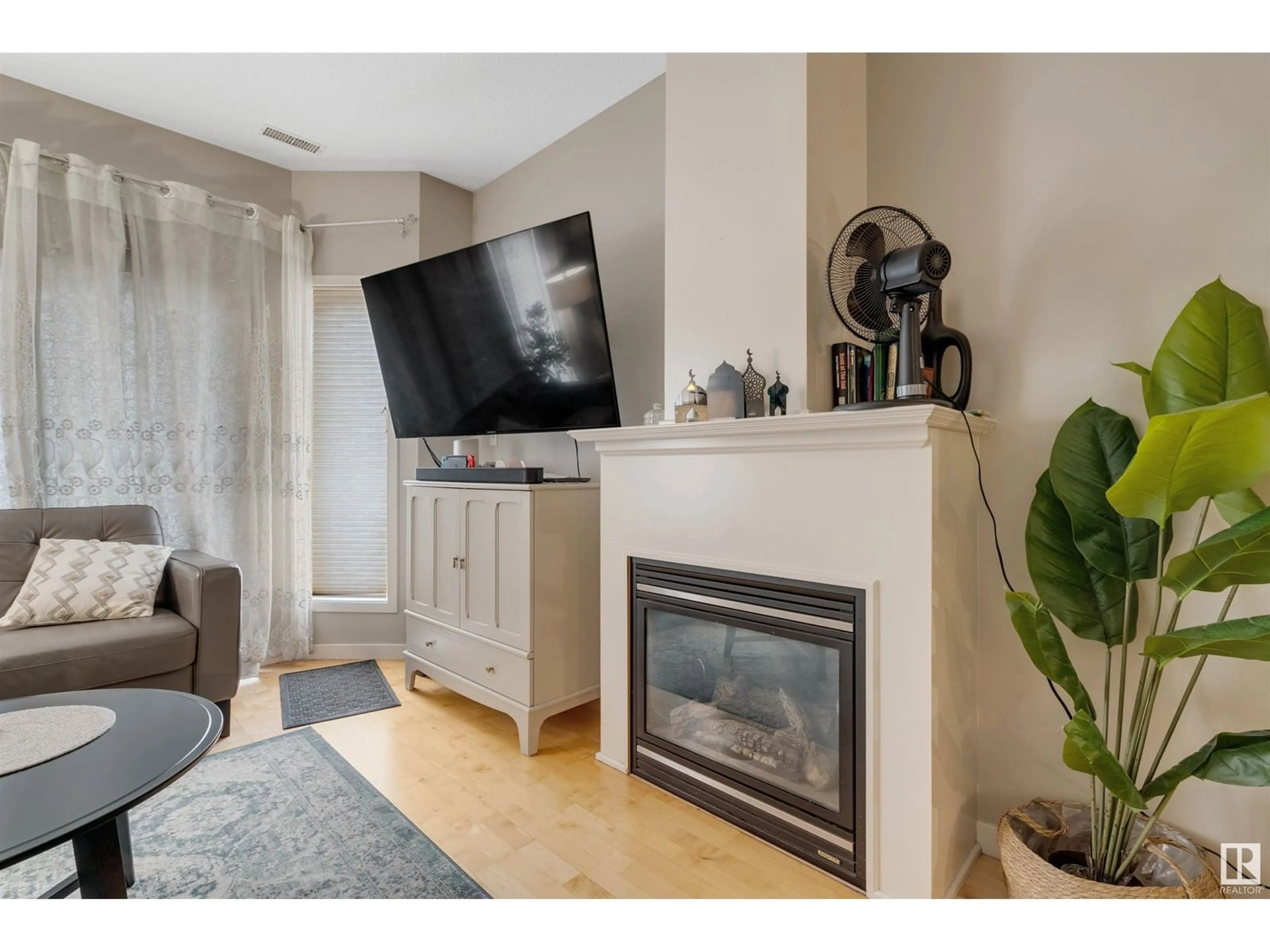 Living room with furniture, unknown for #102 - 4312 139 AV, Edmonton Alberta T5Y3J4