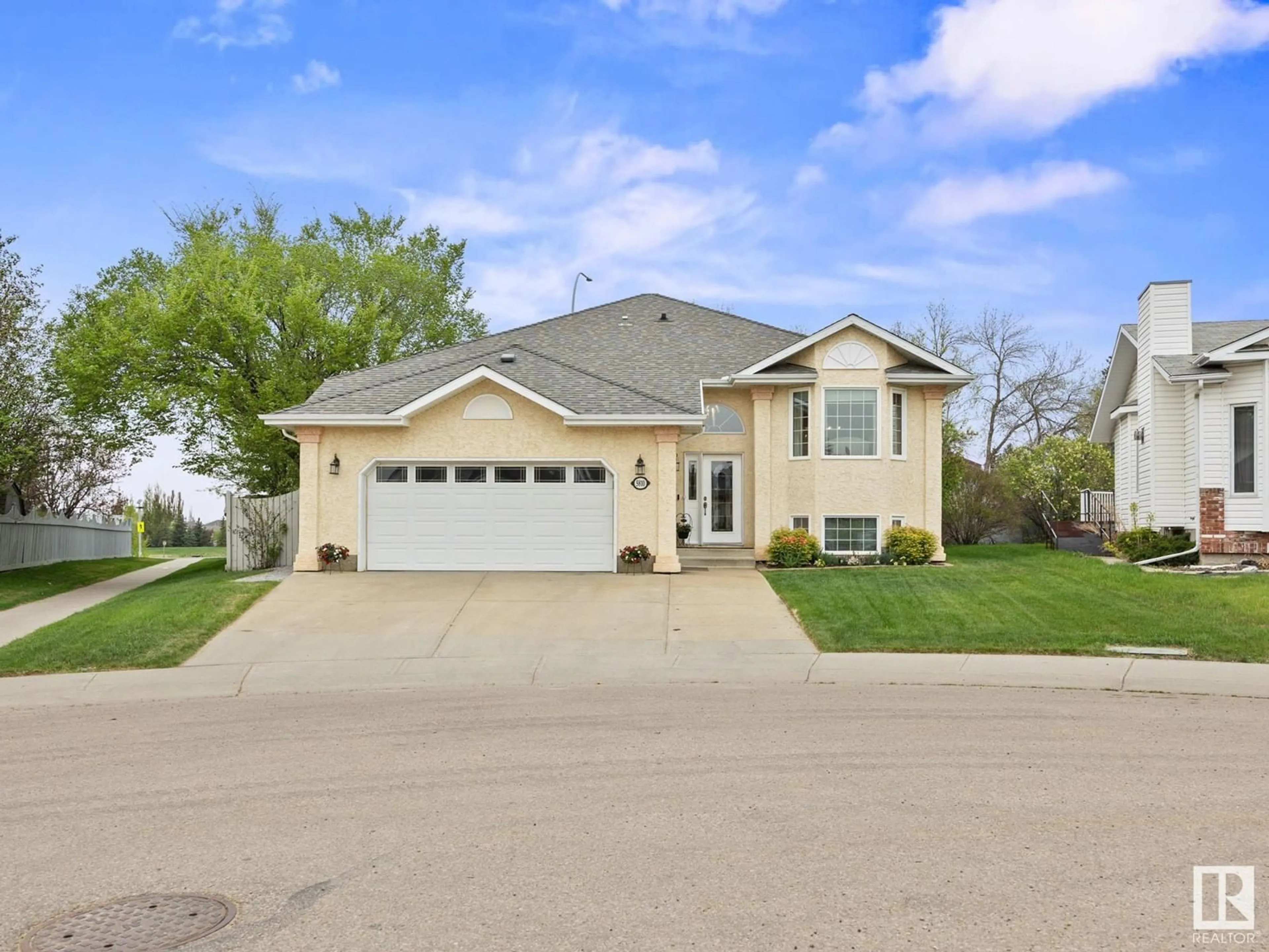 Home with vinyl exterior material, street for 5810 49 AV, Beaumont Alberta T4X1C2