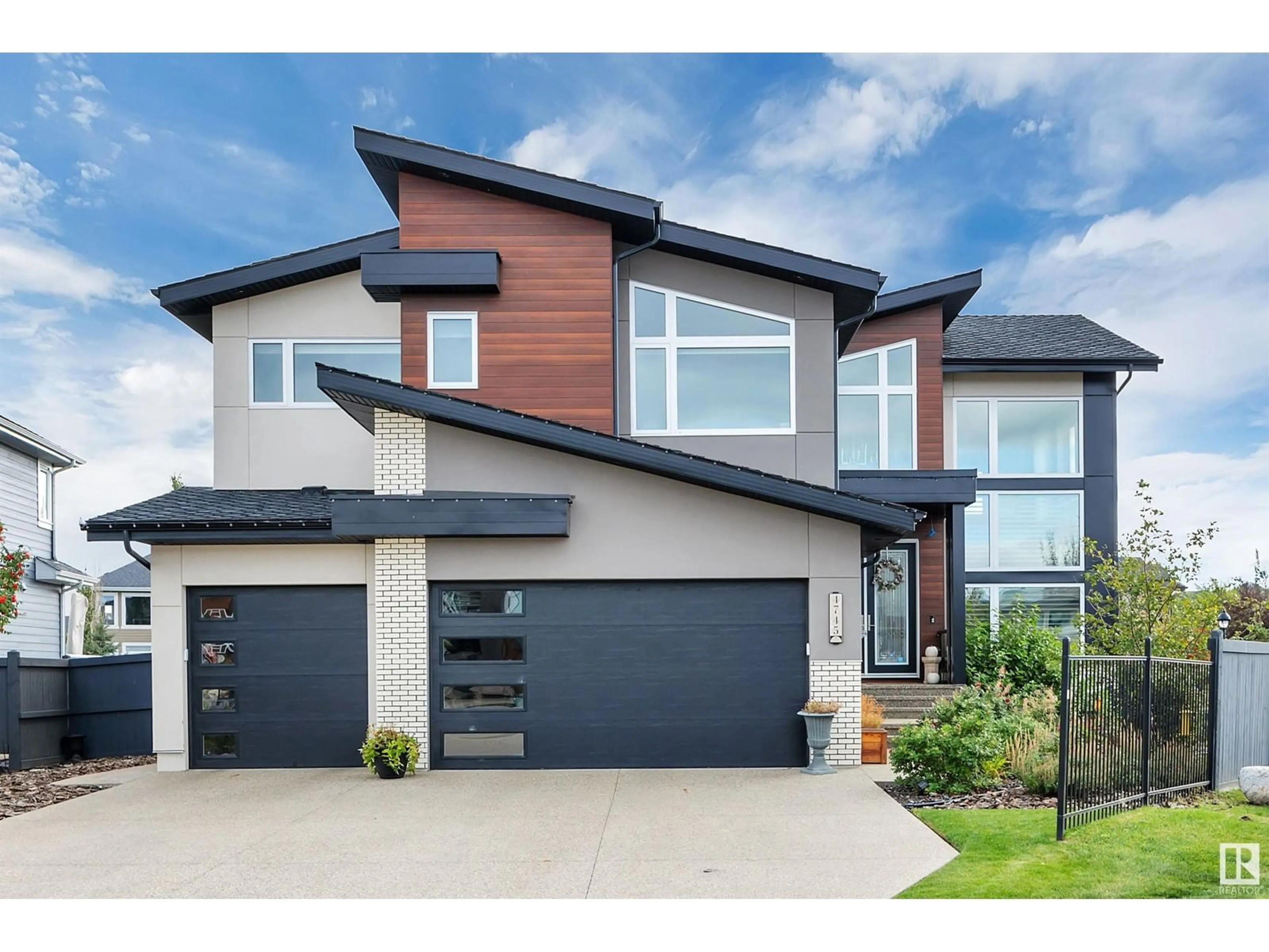 Home with brick exterior material, street for NW - 4745 WOOLSEY CM, Edmonton Alberta T6W2B9