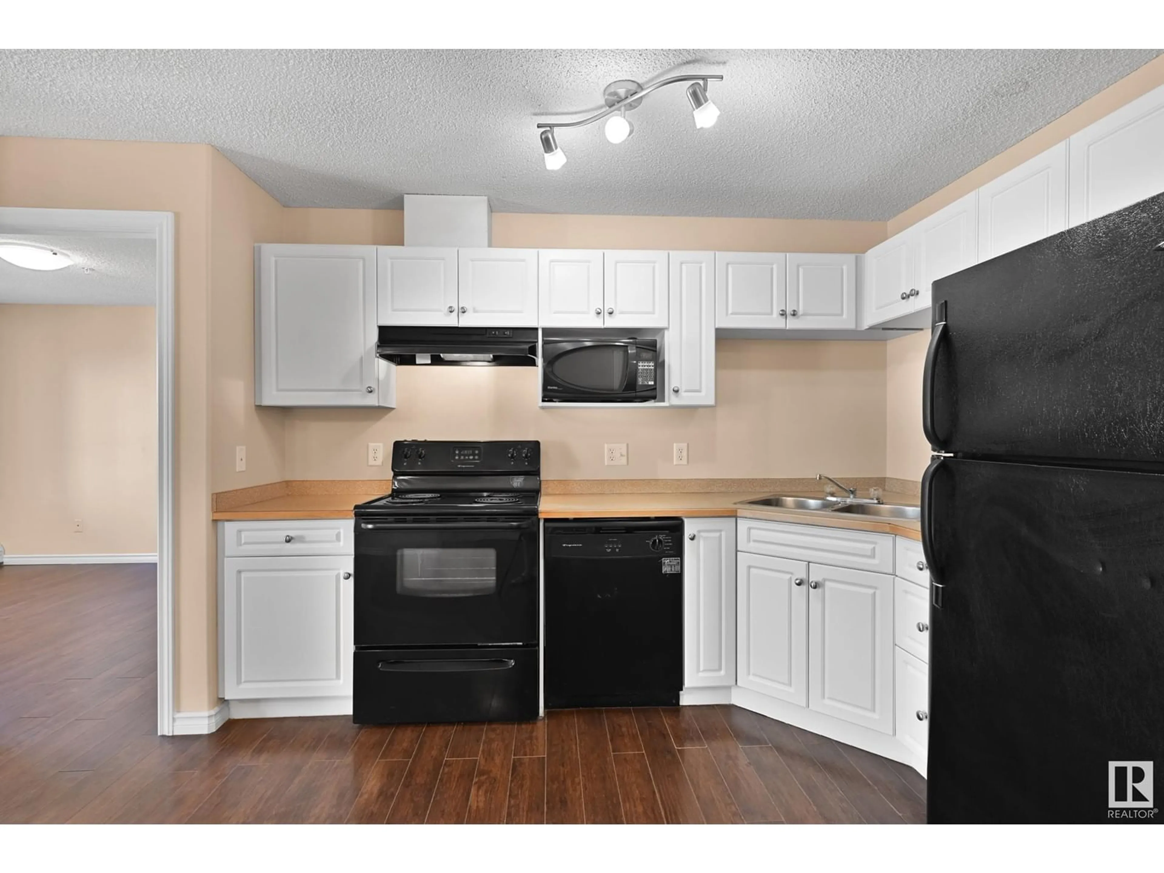 Standard kitchen, wood/laminate floor for #309 - 7511 171 ST, Edmonton Alberta T5T6S7
