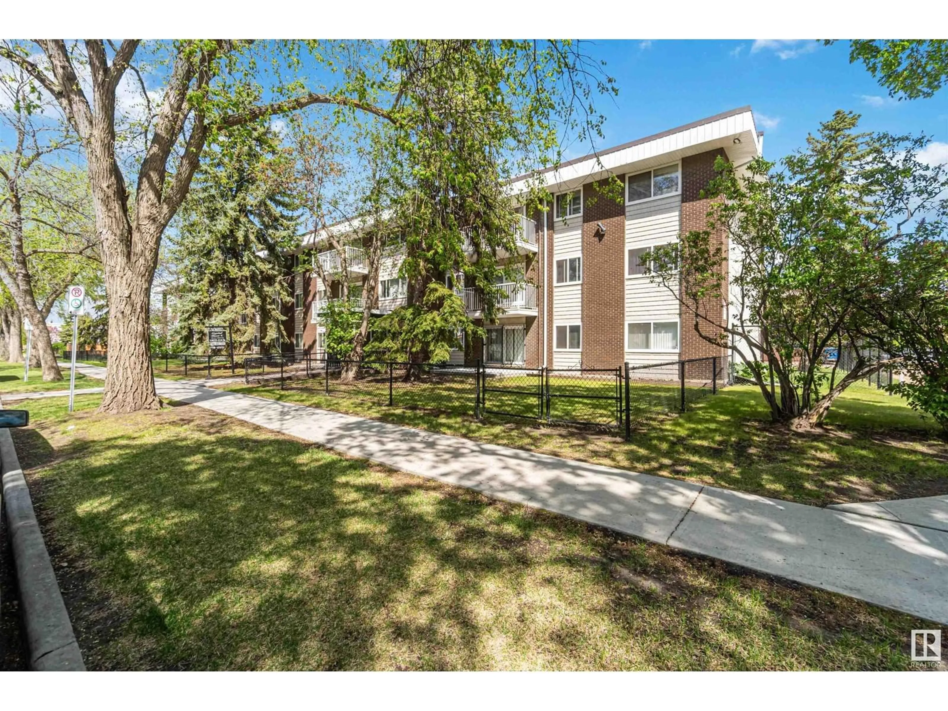 A pic from outside/outdoor area/front of a property/back of a property/a pic from drone, street for 10835 - 110 114 ST, Edmonton Alberta T5H3K3