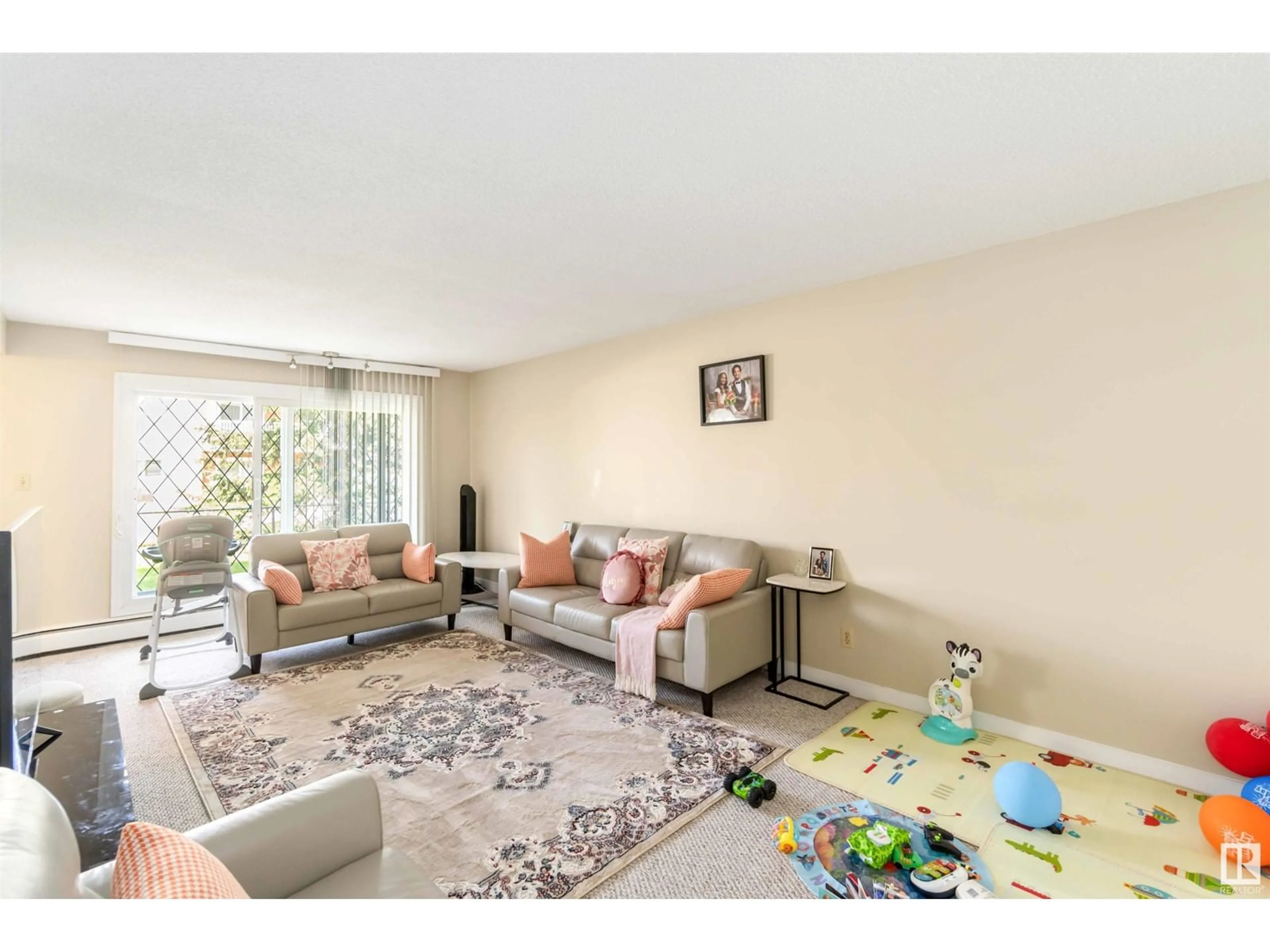 Living room with furniture, unknown for 10835 - 110 114 ST, Edmonton Alberta T5H3K3