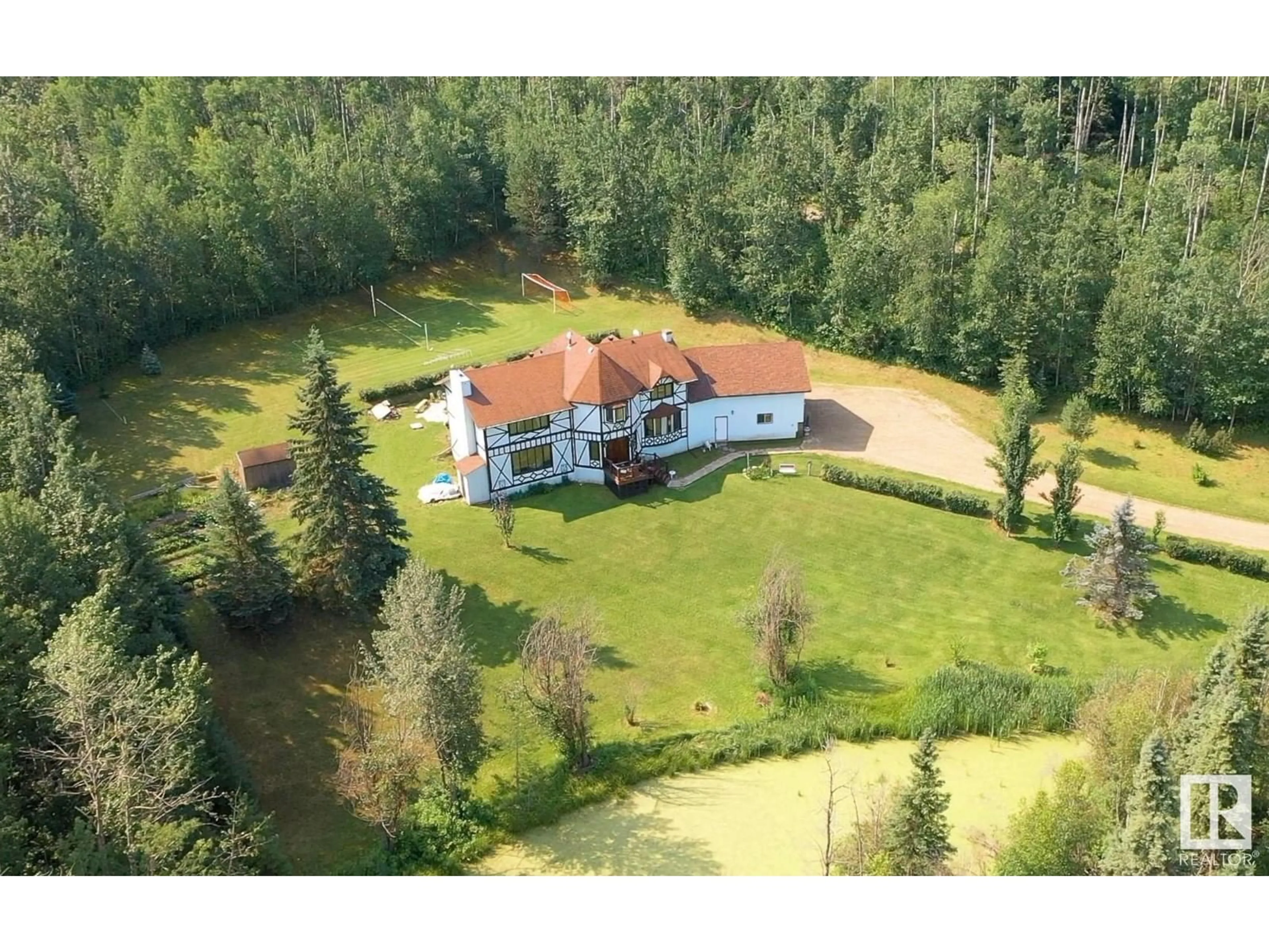 A pic from outside/outdoor area/front of a property/back of a property/a pic from drone, unknown for 54422 - 3 RGE RD 13, Rural Lac Ste. Anne County Alberta T0E1V2