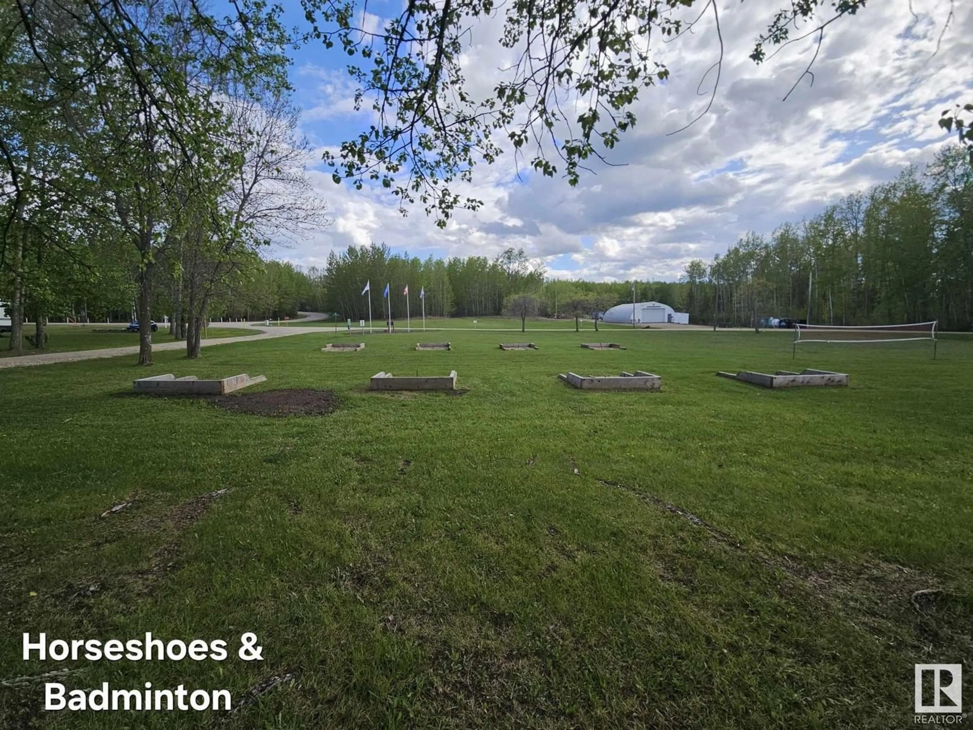 A pic from outside/outdoor area/front of a property/back of a property/a pic from drone, forest/trees view for 3 POPPY PL, Rural Lac Ste. Anne County Alberta T0E0V0