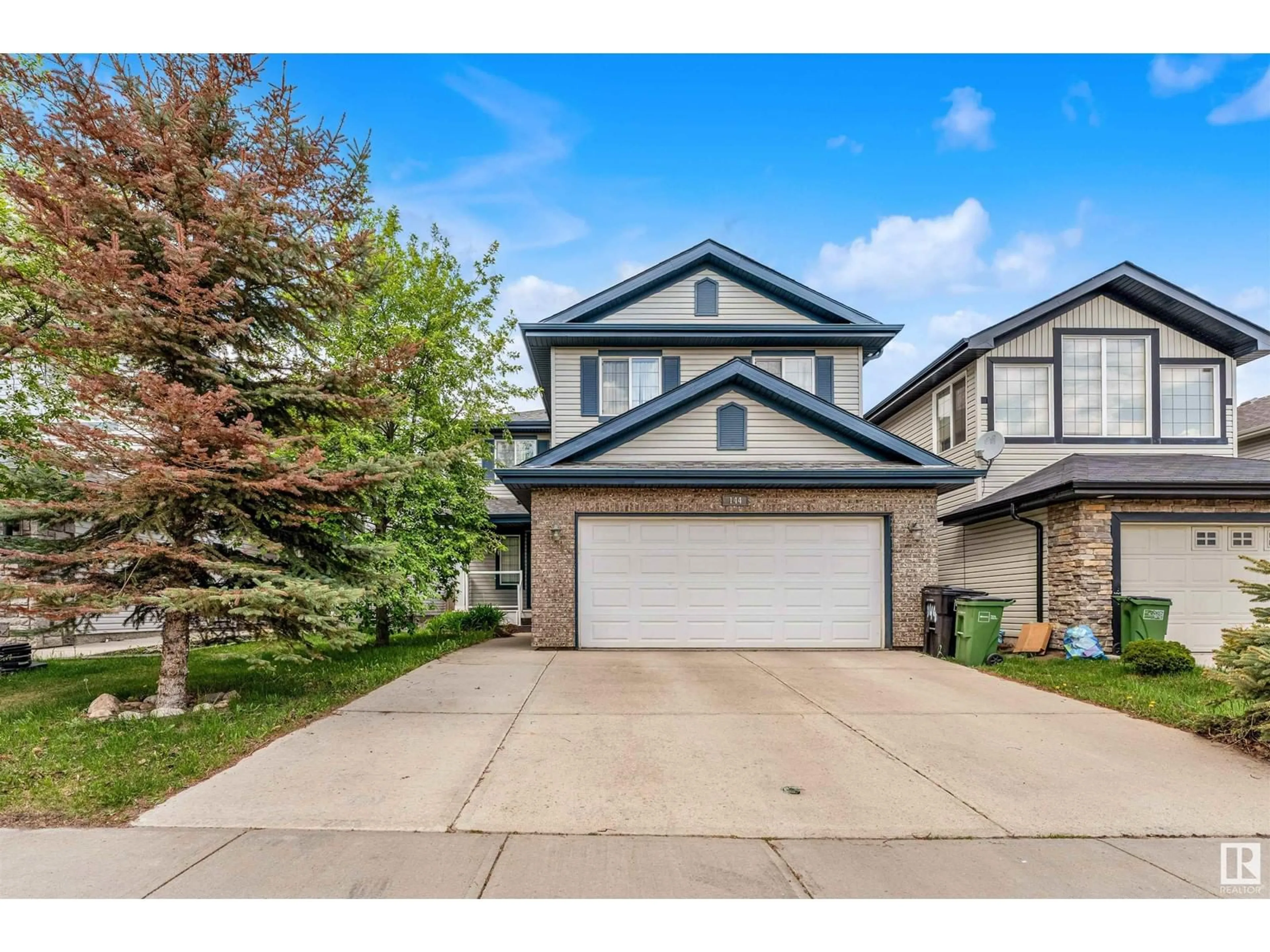 Home with vinyl exterior material, street for 144 55 ST, Edmonton Alberta T6X0L2