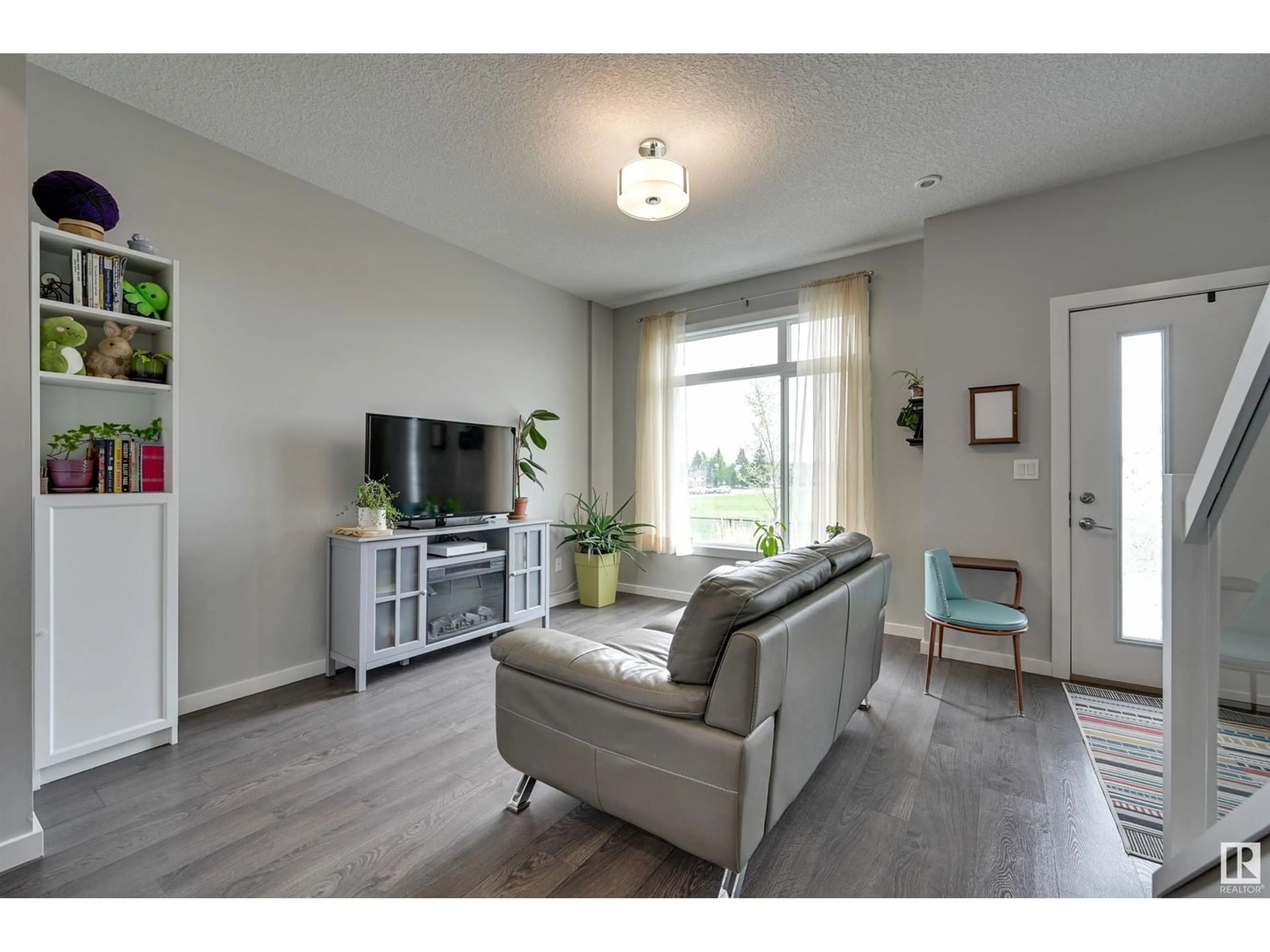 Living room with furniture, unknown for 49 215 SADDLEBACK RD, Edmonton Alberta T6J5T6