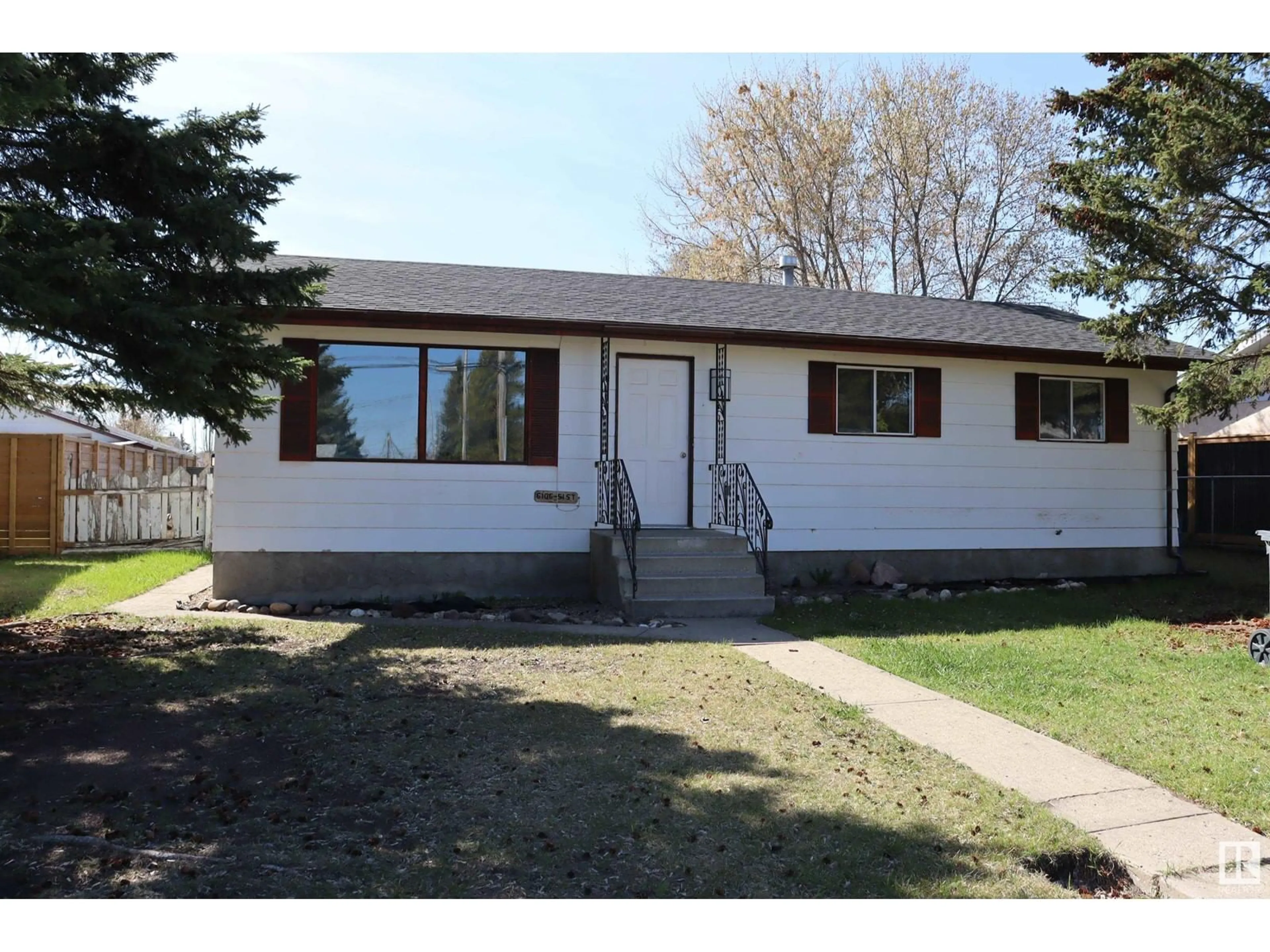 Home with vinyl exterior material, street for 6106 51ST, Ponoka Alberta T4J1E6
