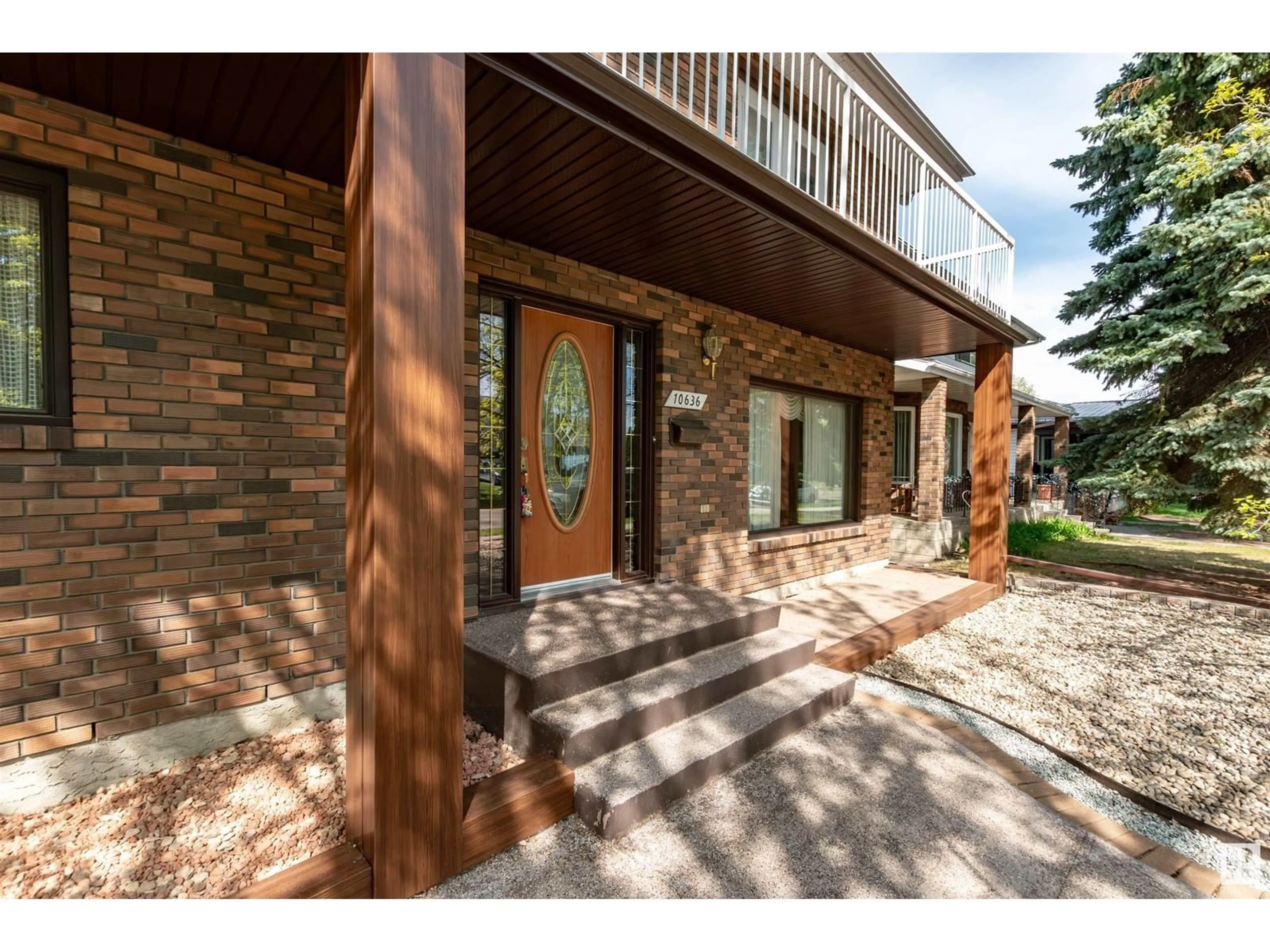 Home with brick exterior material, street for NW - 10636 80 ST, Edmonton Alberta T6A3K1