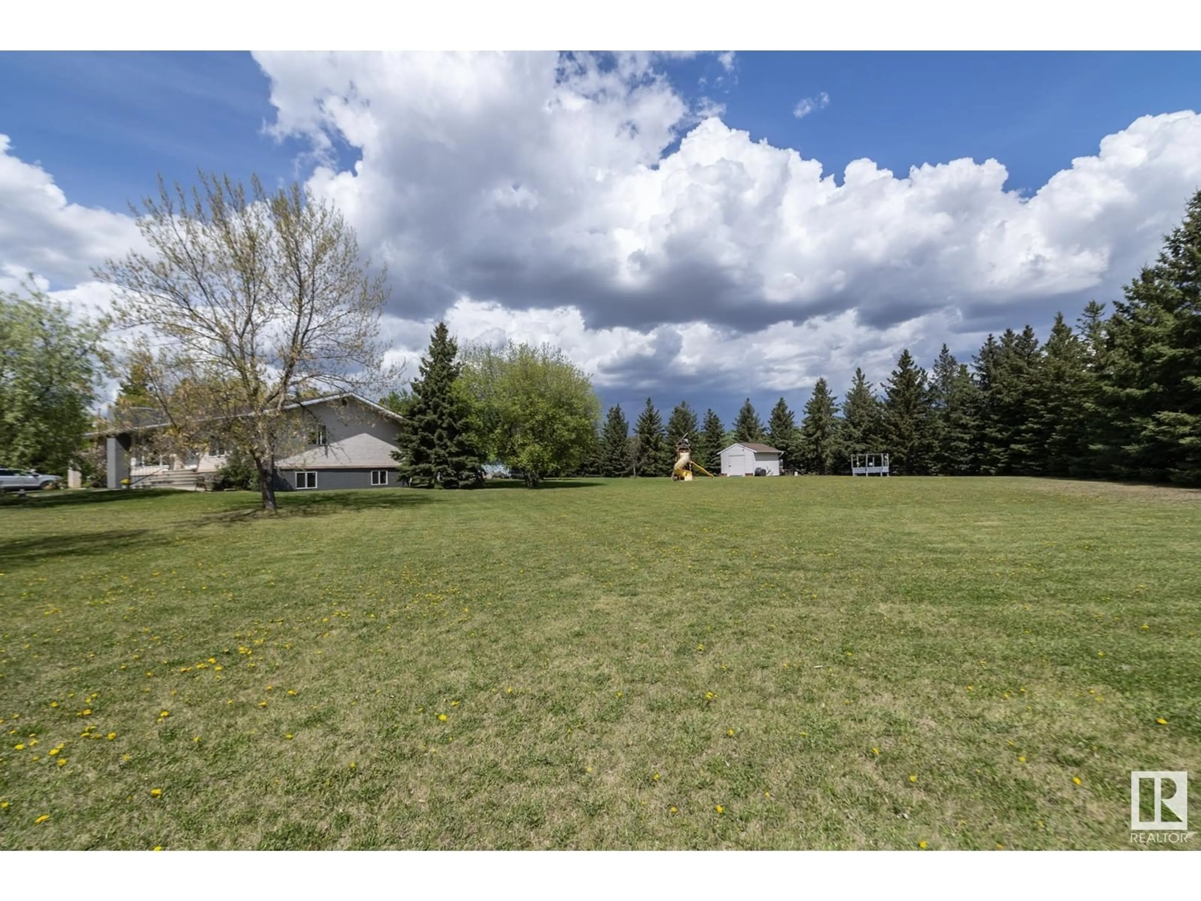 A pic from outside/outdoor area/front of a property/back of a property/a pic from drone, mountain view for 26 255041 TWP ROAD ROAD, Rural Wetaskiwin County Alberta T0C1Z0