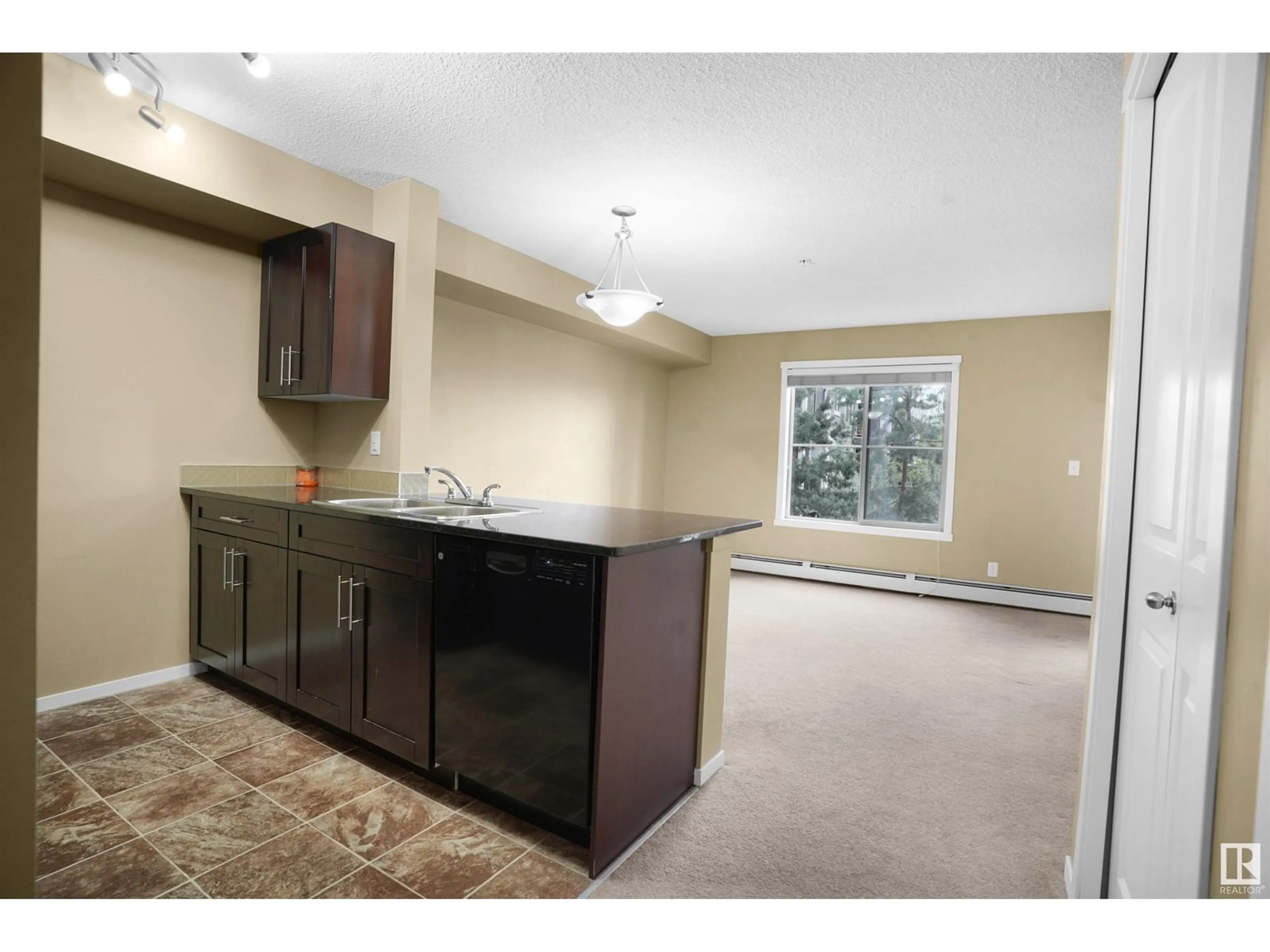 Open concept kitchen, unknown for #212 - 5370 CHAPPELLE RD, Edmonton Alberta T6W3L5