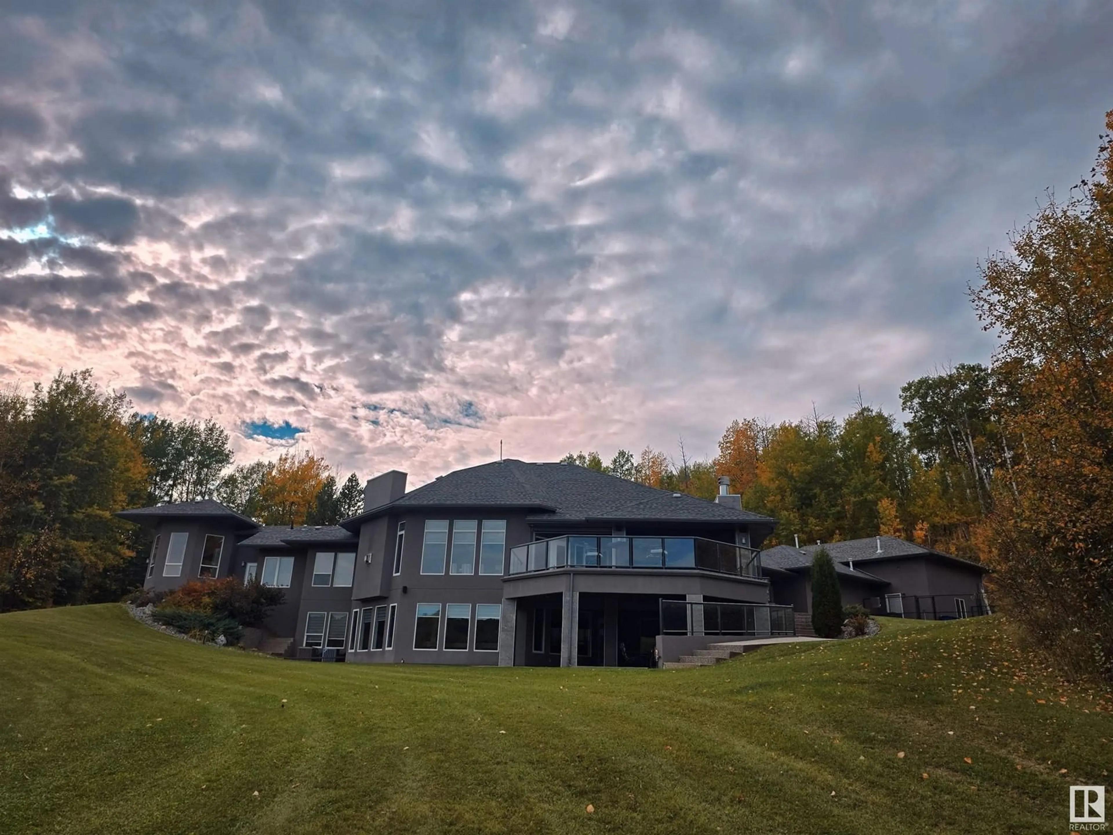 A pic from outside/outdoor area/front of a property/back of a property/a pic from drone, mountain view for 53417 RGE RD 15, Rural Parkland County Alberta T7Y3H0
