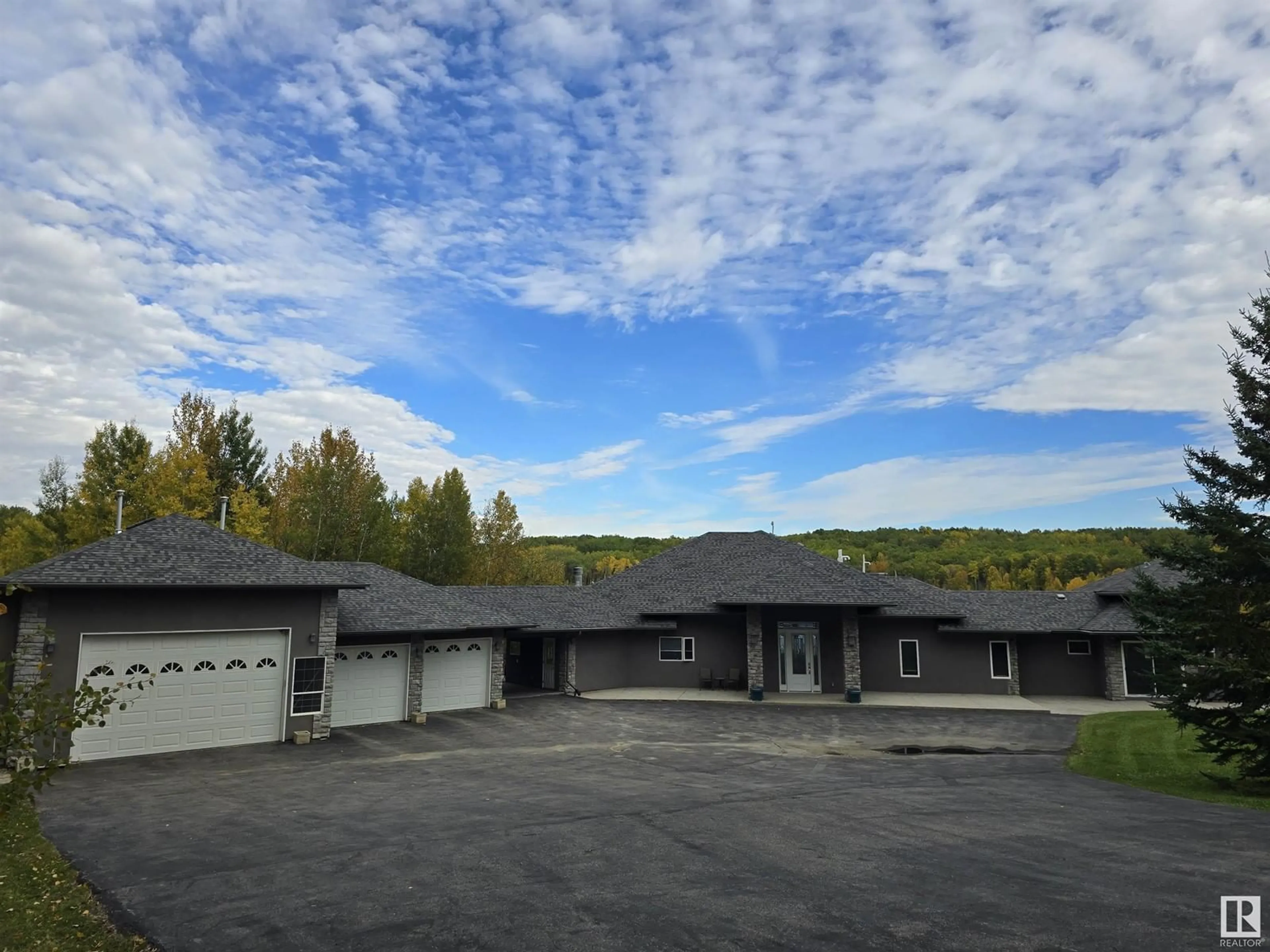 A pic from outside/outdoor area/front of a property/back of a property/a pic from drone, mountain view for 53417 RGE RD 15, Rural Parkland County Alberta T7Y3H0