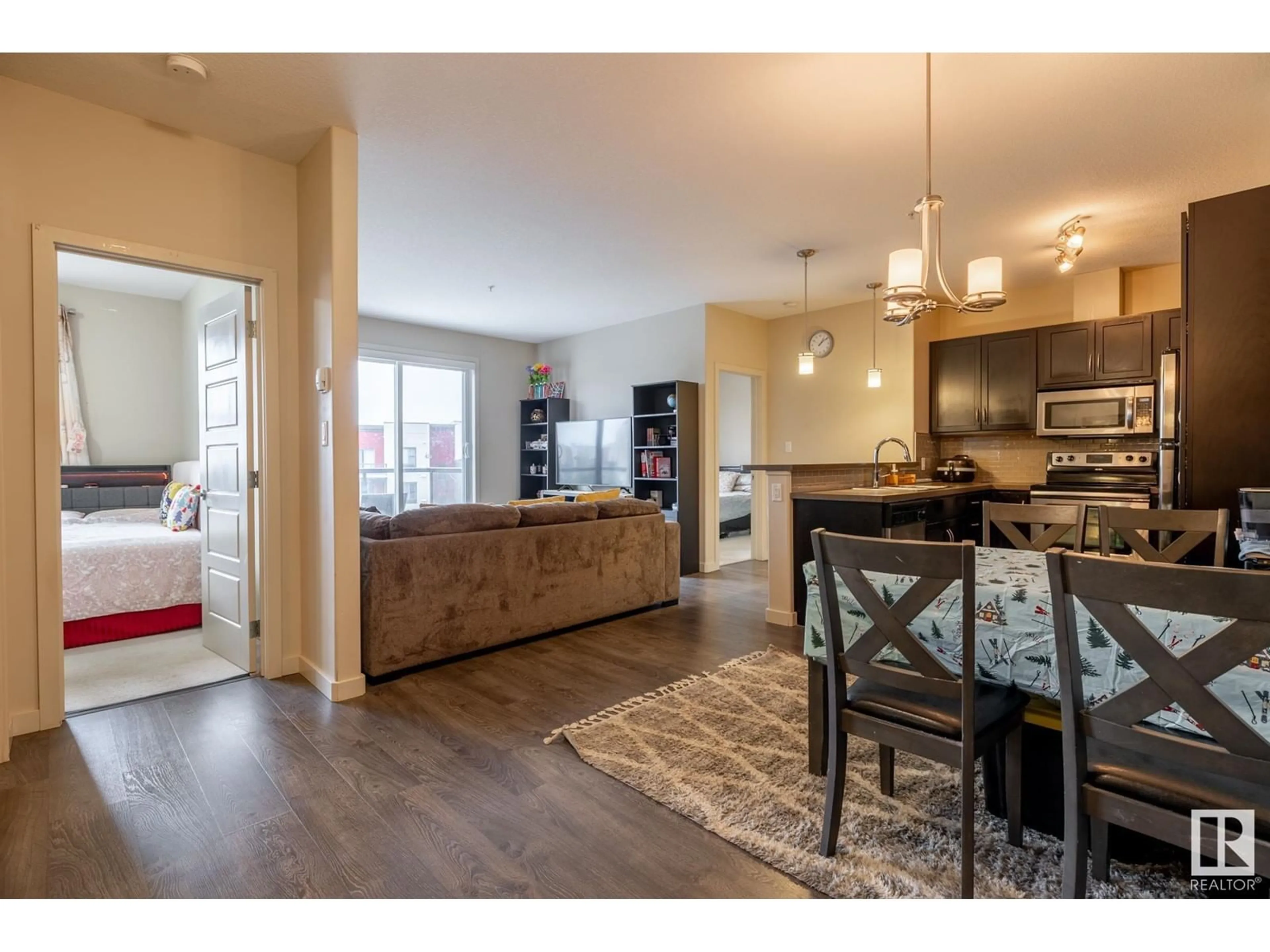 Open concept kitchen, wood/laminate floor for 308 - 430 AMBLESIDE LINK, Edmonton Alberta T6W0V3