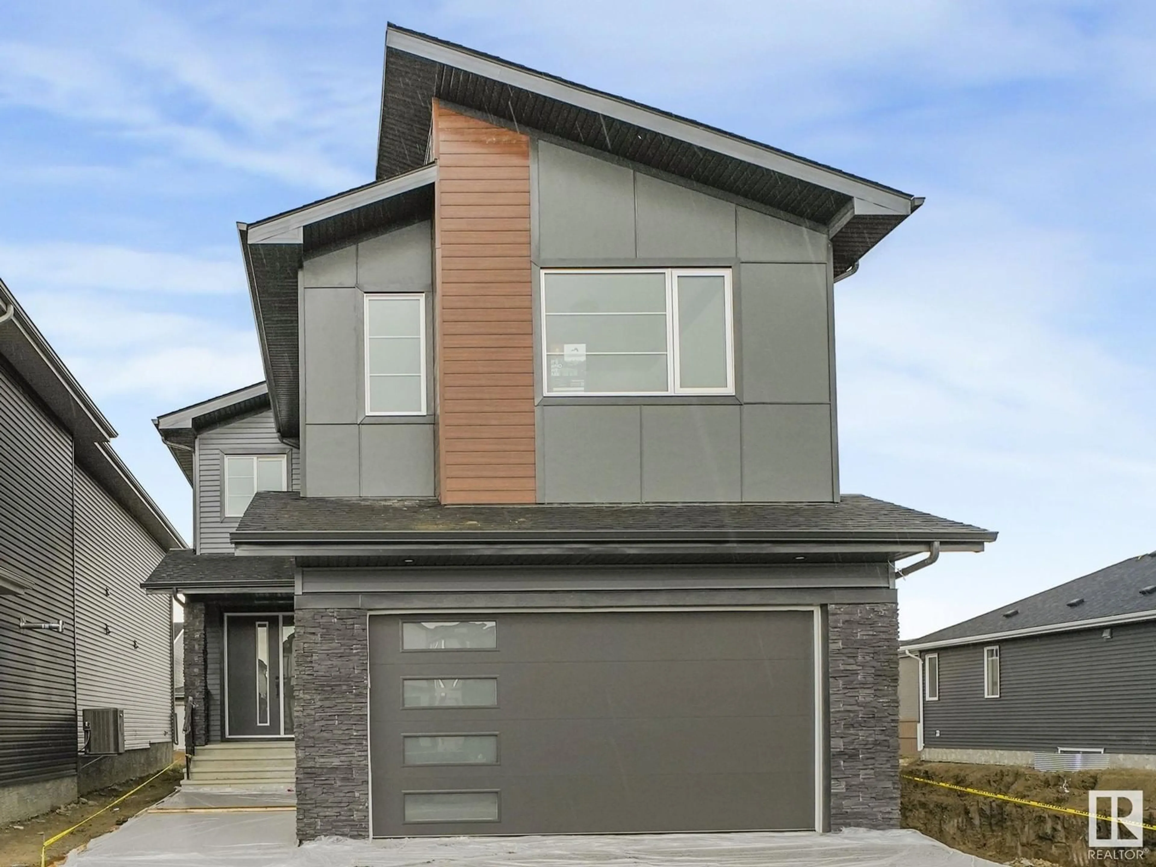 Home with brick exterior material, street for 141 CREEKSIDE LN, Leduc Alberta T9E1T1