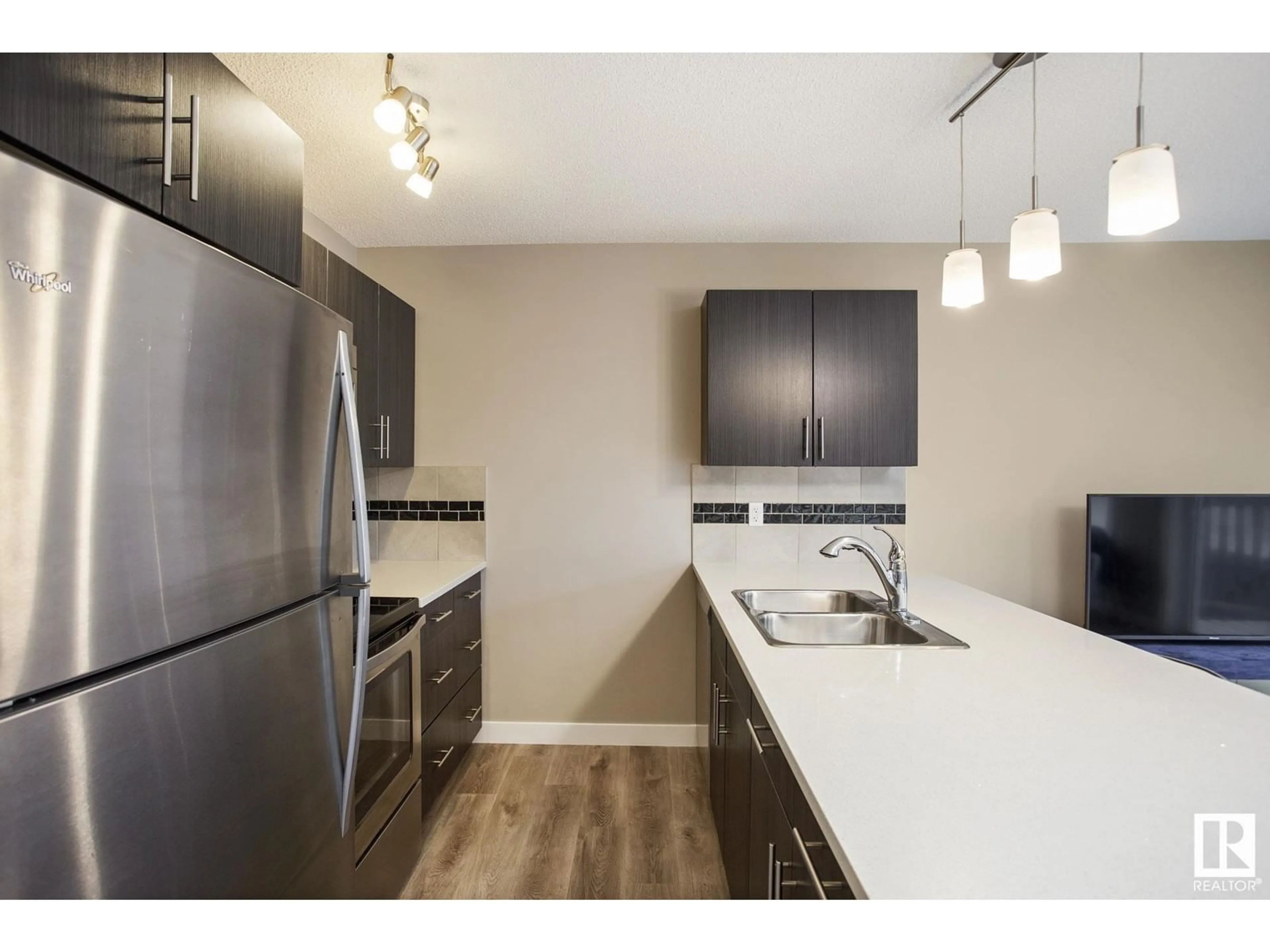 Standard kitchen, wood/laminate floor for 2004 - 30 TRUMPETER WY, Edmonton Alberta T5S0J9