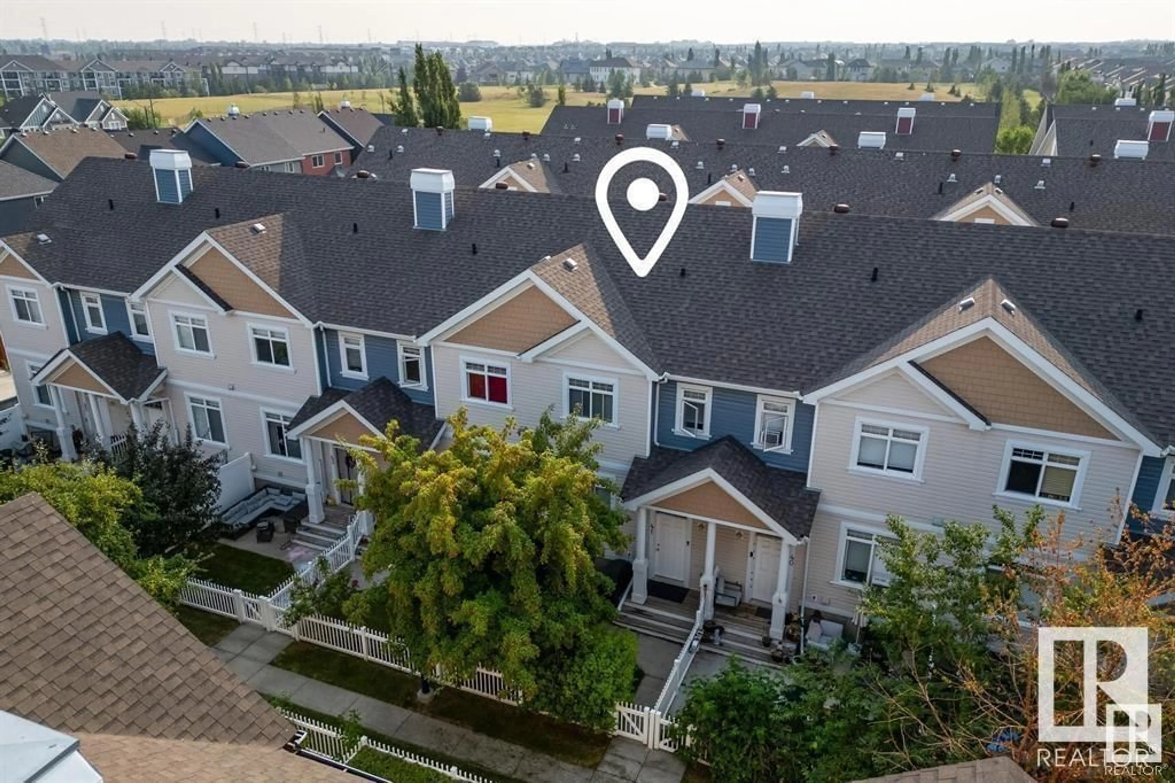 A pic from outside/outdoor area/front of a property/back of a property/a pic from drone, unknown for 170 - 1804 70 ST, Edmonton Alberta T6X0H4