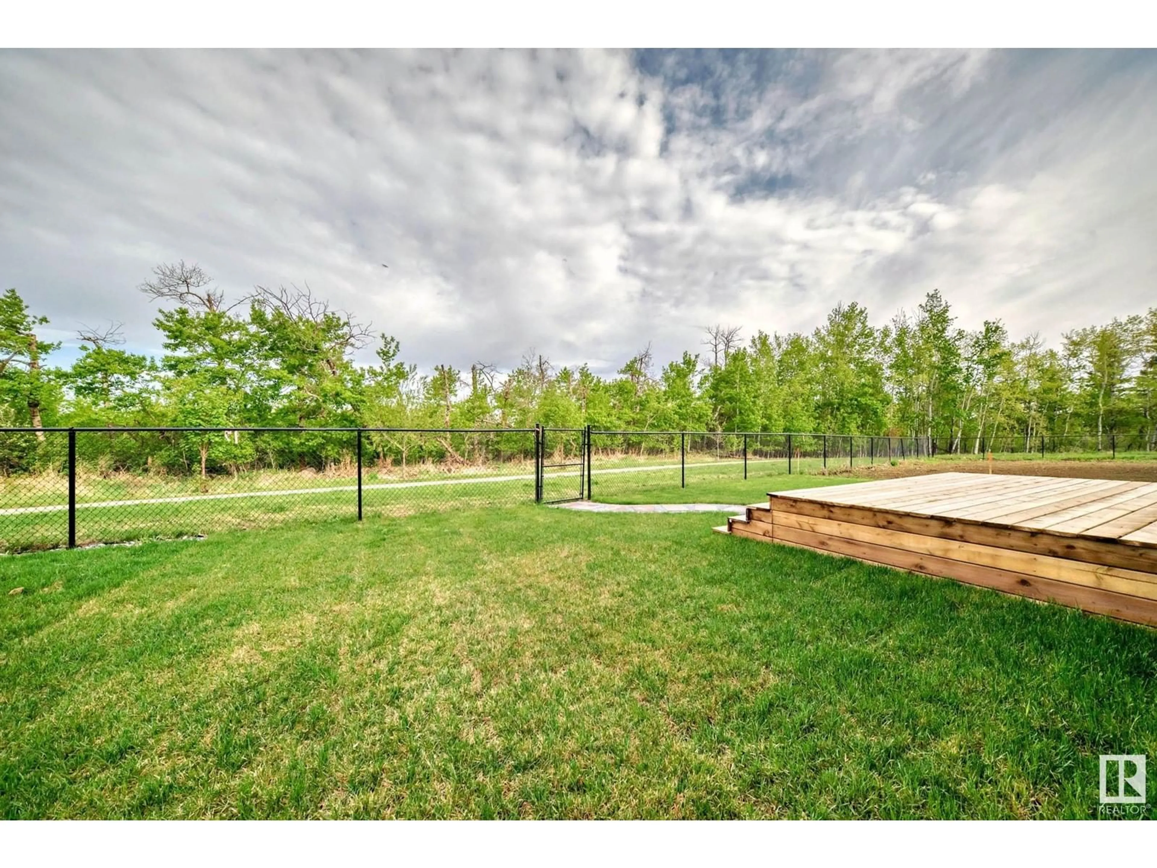 Patio, forest/trees view for NW - 2648 208 ST, Edmonton Alberta T6M1P3