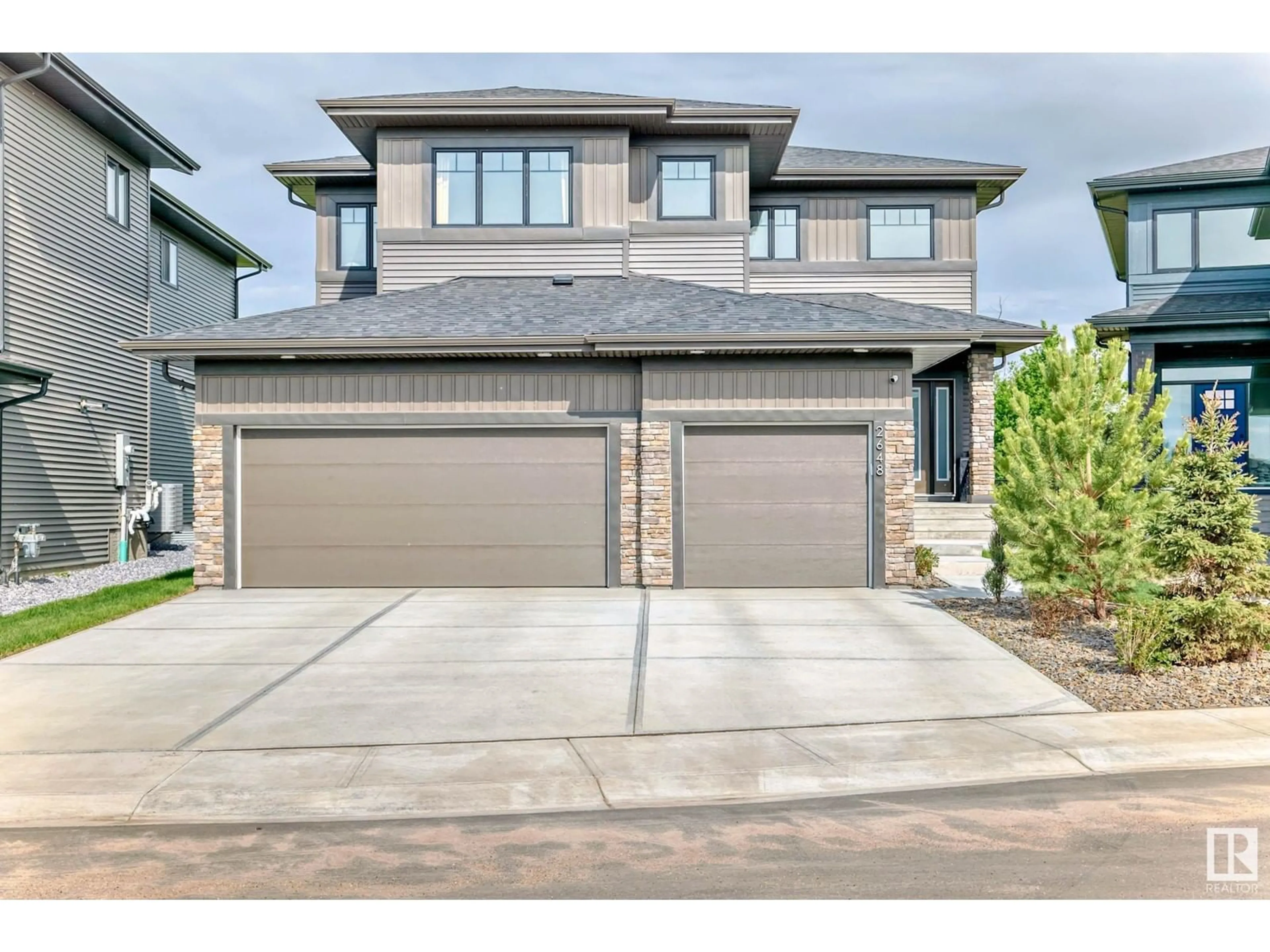 Home with brick exterior material, street for NW - 2648 208 ST, Edmonton Alberta T6M1P3