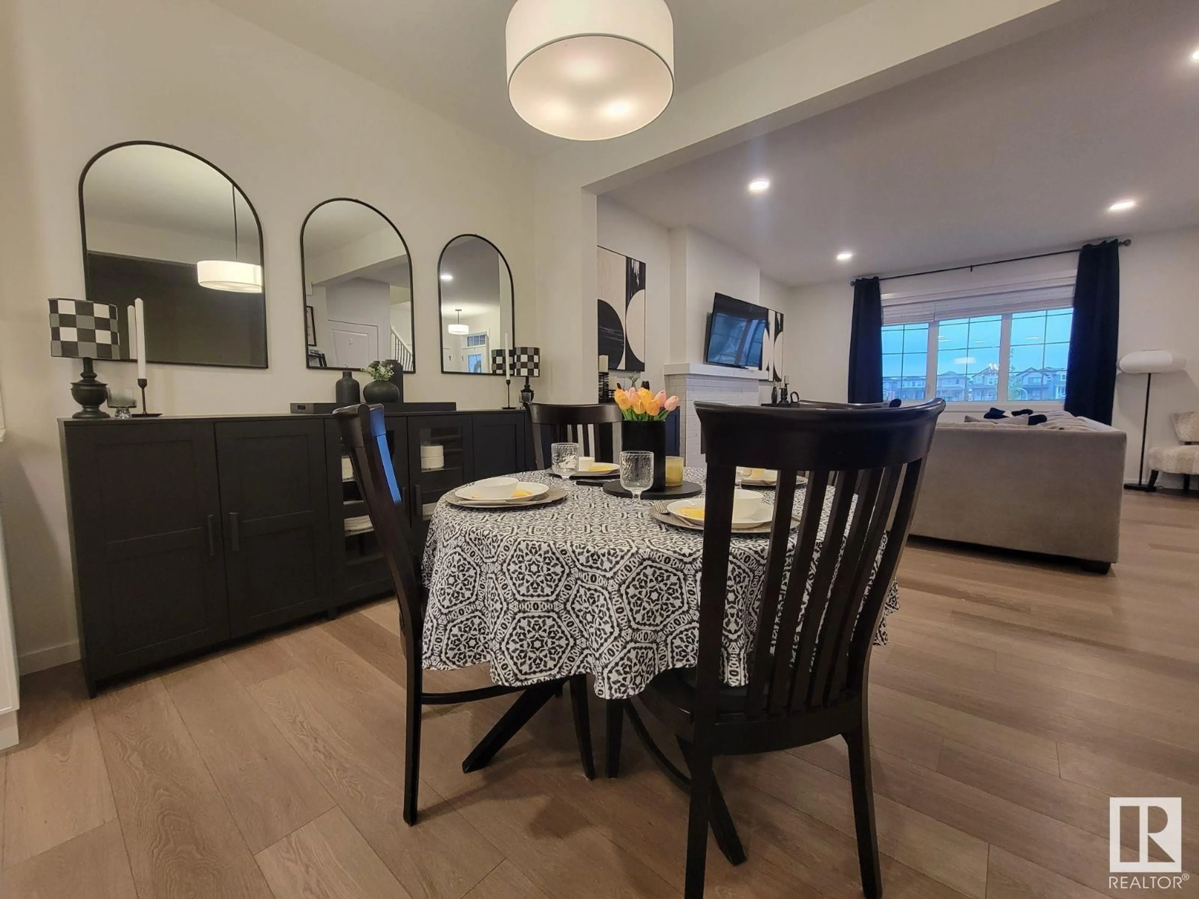 Dining room, wood/laminate floor for 7012 - 7012 54 AV, Beaumont Alberta T4X2Z9