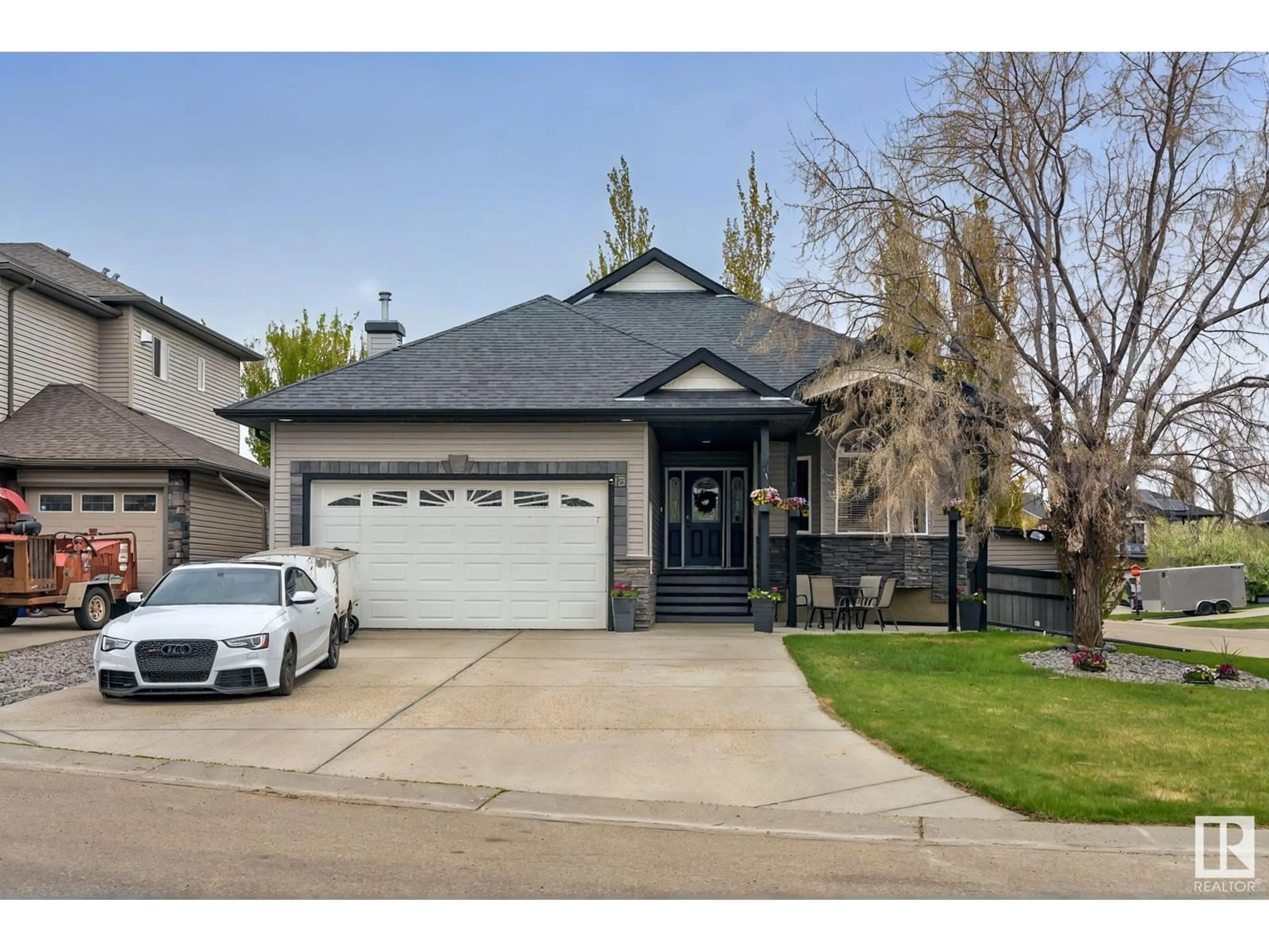 Home with vinyl exterior material, street for 15 KRAHN CO, Leduc Alberta T9E0A3