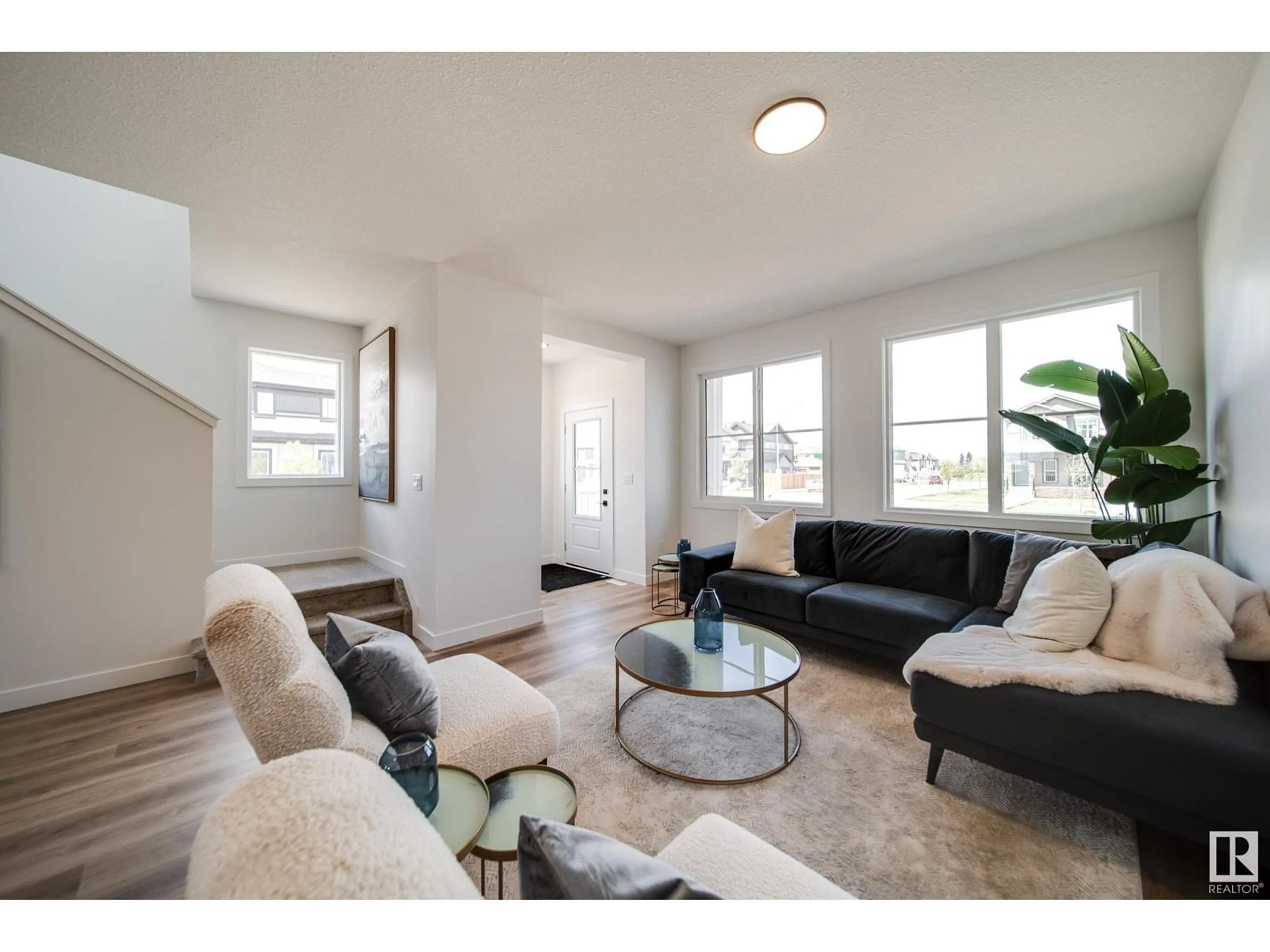 Living room with furniture, wood/laminate floor for 45 SIENNA BOULEVARD, Fort Saskatchewan Alberta T8L0W3