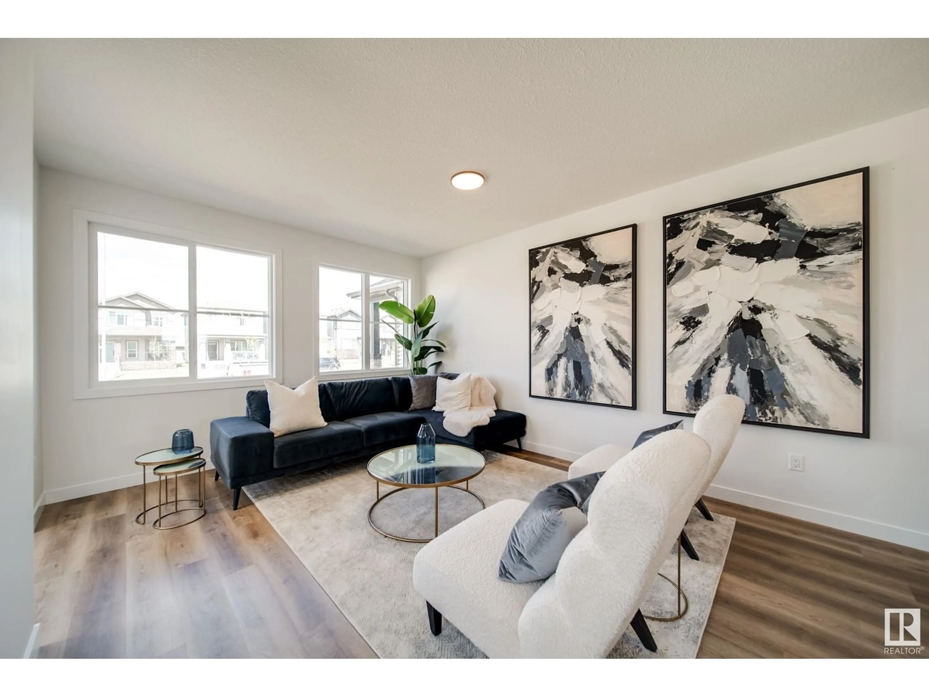 Living room with furniture, wood/laminate floor for 45 SIENNA BOULEVARD, Fort Saskatchewan Alberta T8L0W3