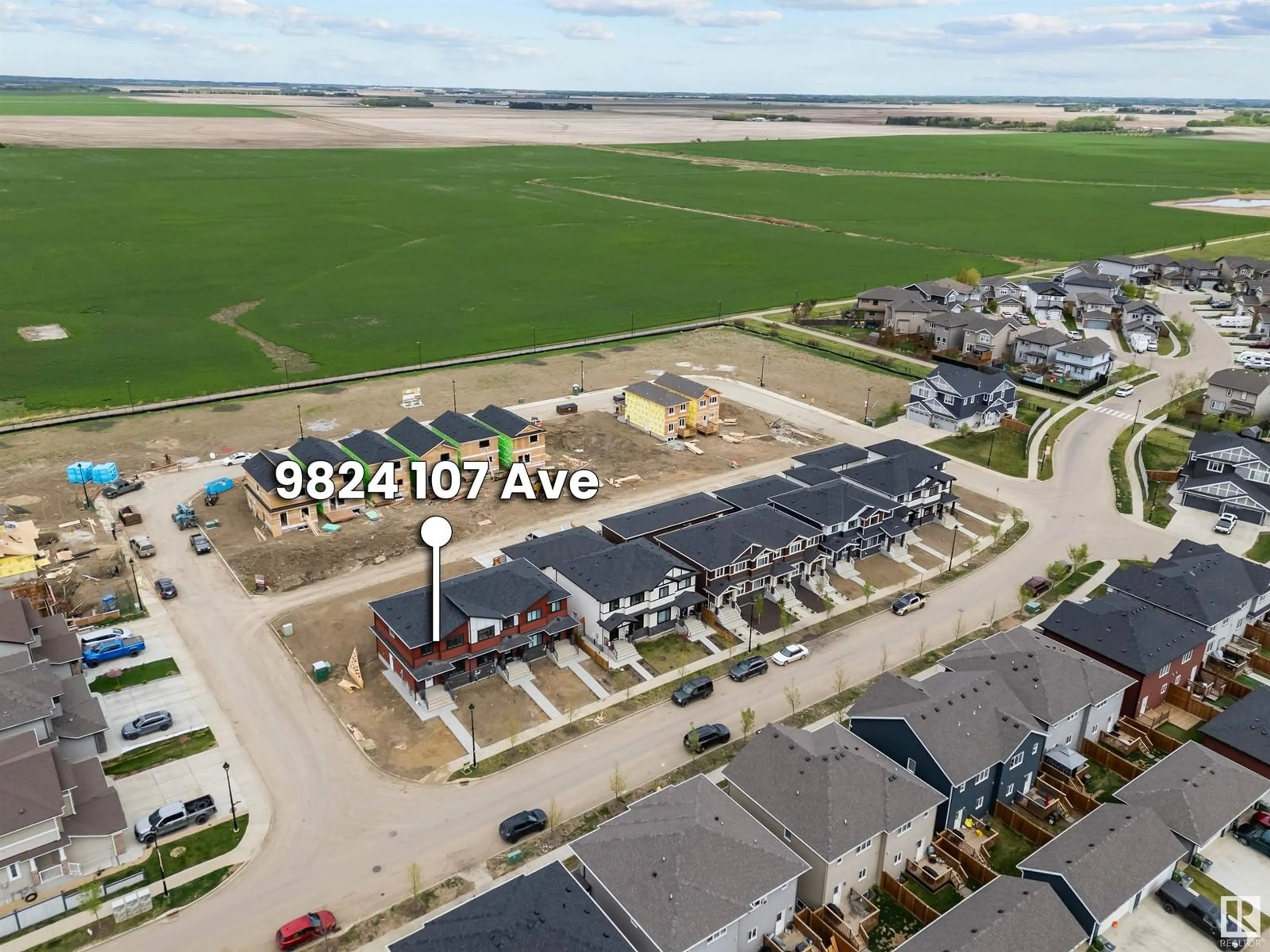 A pic from outside/outdoor area/front of a property/back of a property/a pic from drone, street for 9826 107 AV, Morinville Alberta T8R2P1