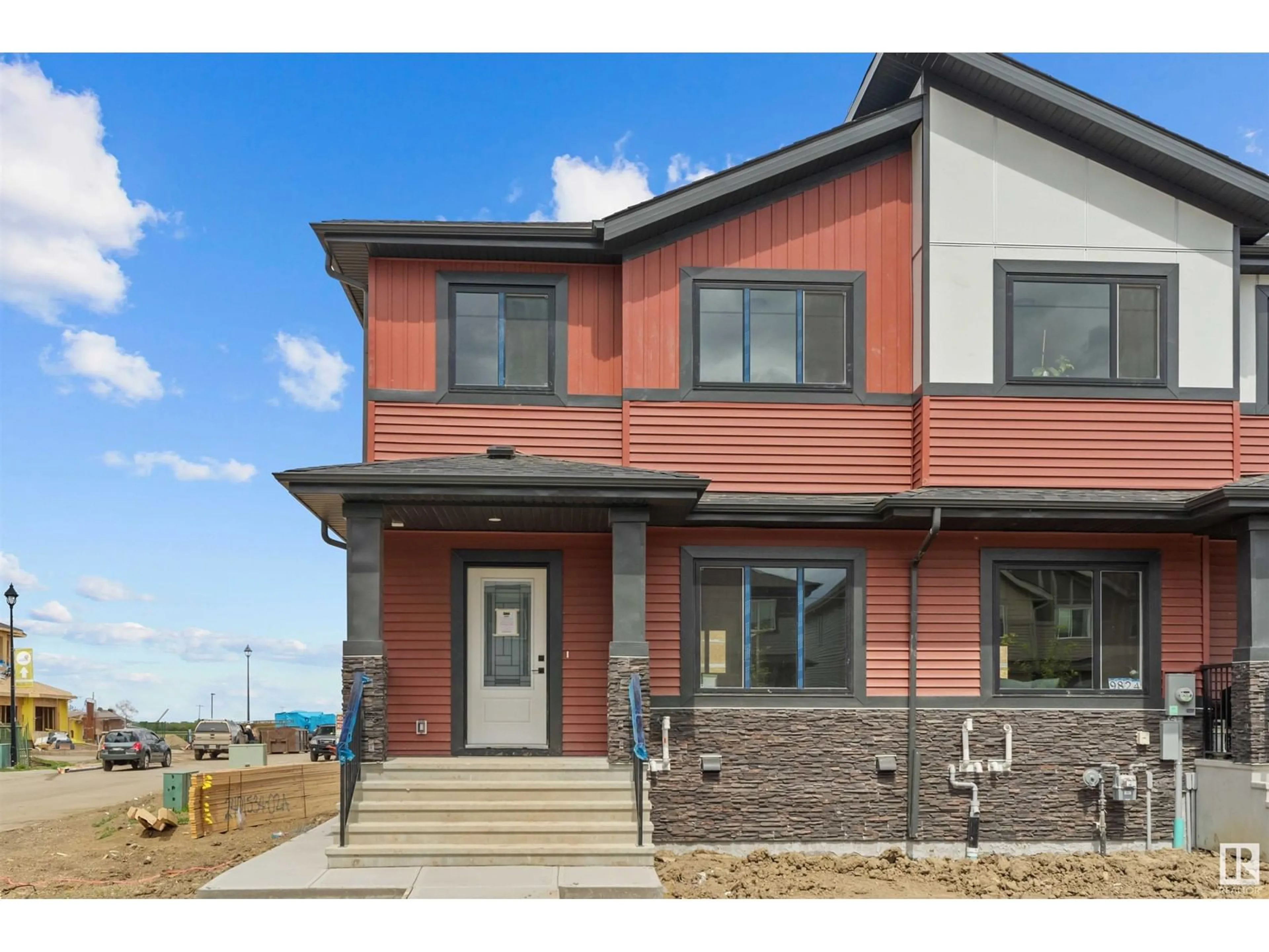 Home with brick exterior material, street for 9826 107 AV, Morinville Alberta T8R2P1