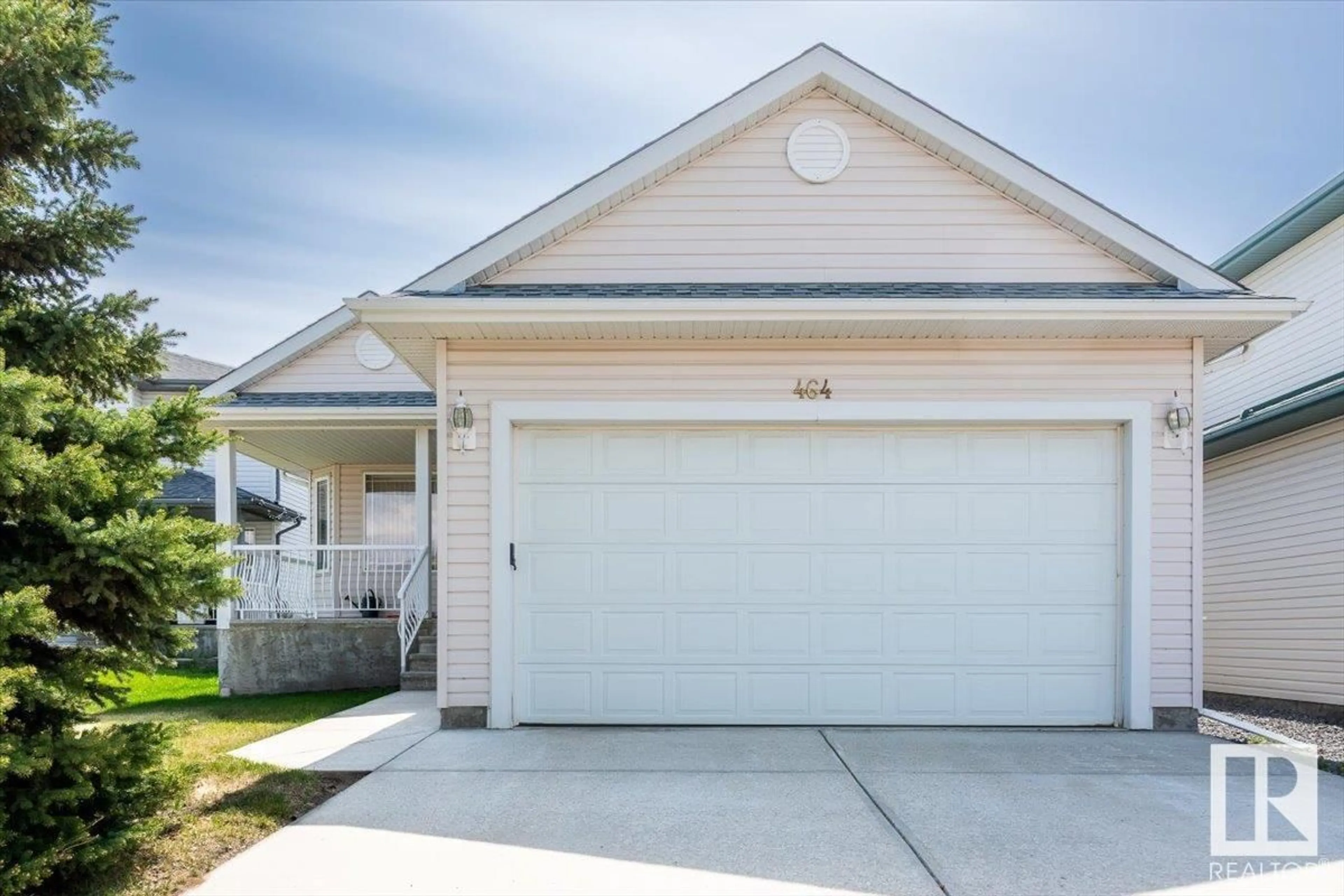 Home with vinyl exterior material, street for 464 KANANASKIS CL, Devon Alberta T9G2C5