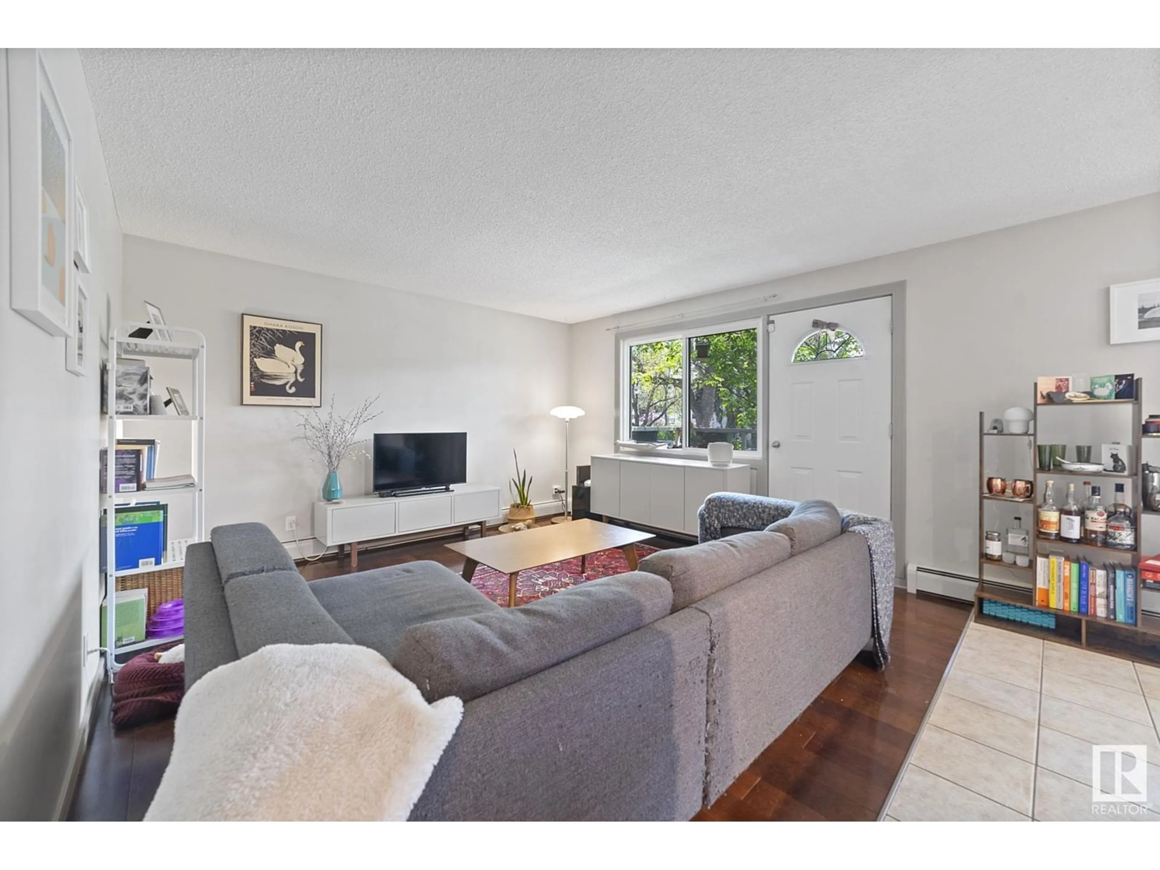 Living room with furniture, unknown for 5 - 10710 84 AV, Edmonton Alberta T6E2H9