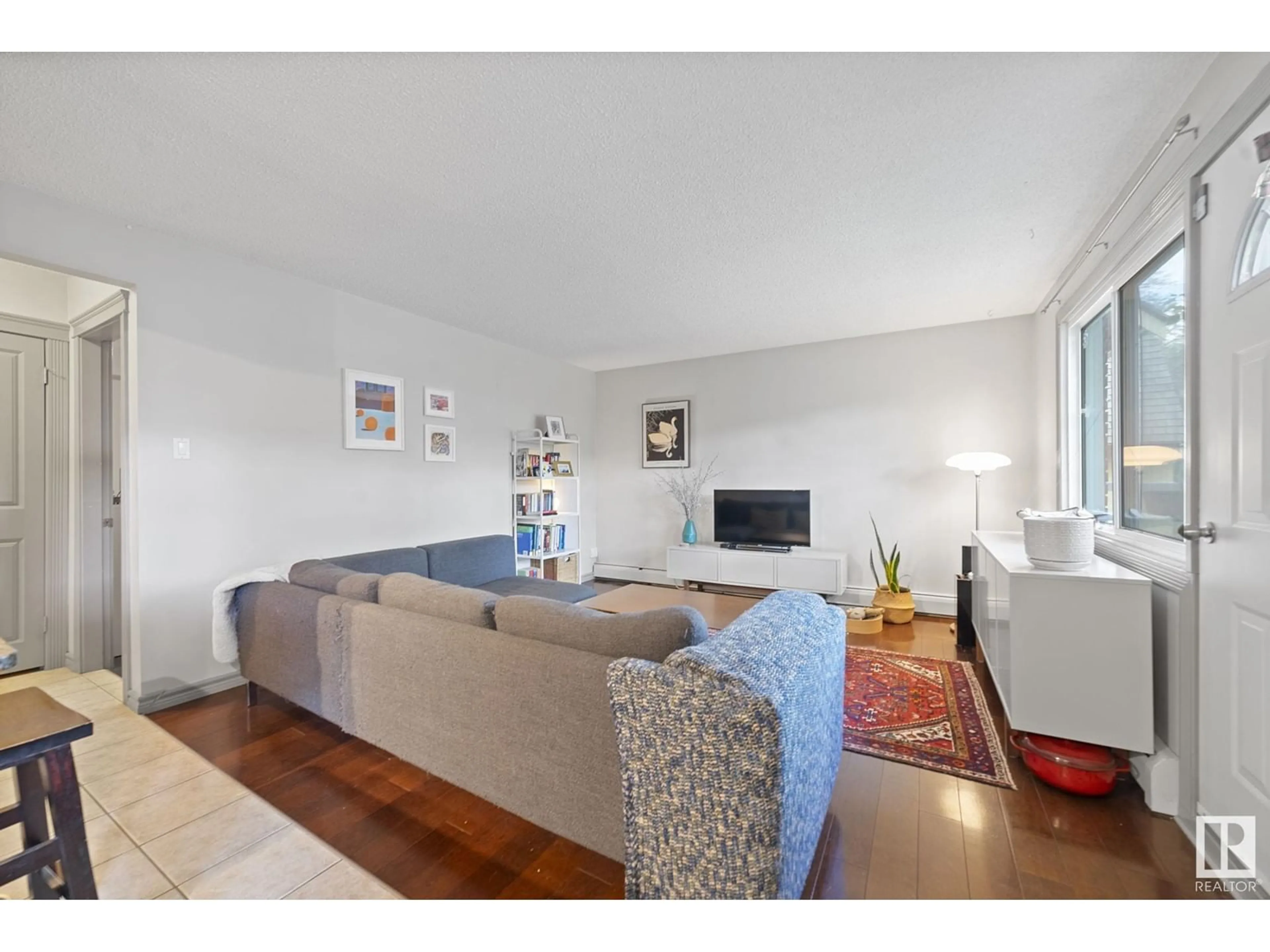 Living room with furniture, unknown for 5 - 10710 84 AV, Edmonton Alberta T6E2H9