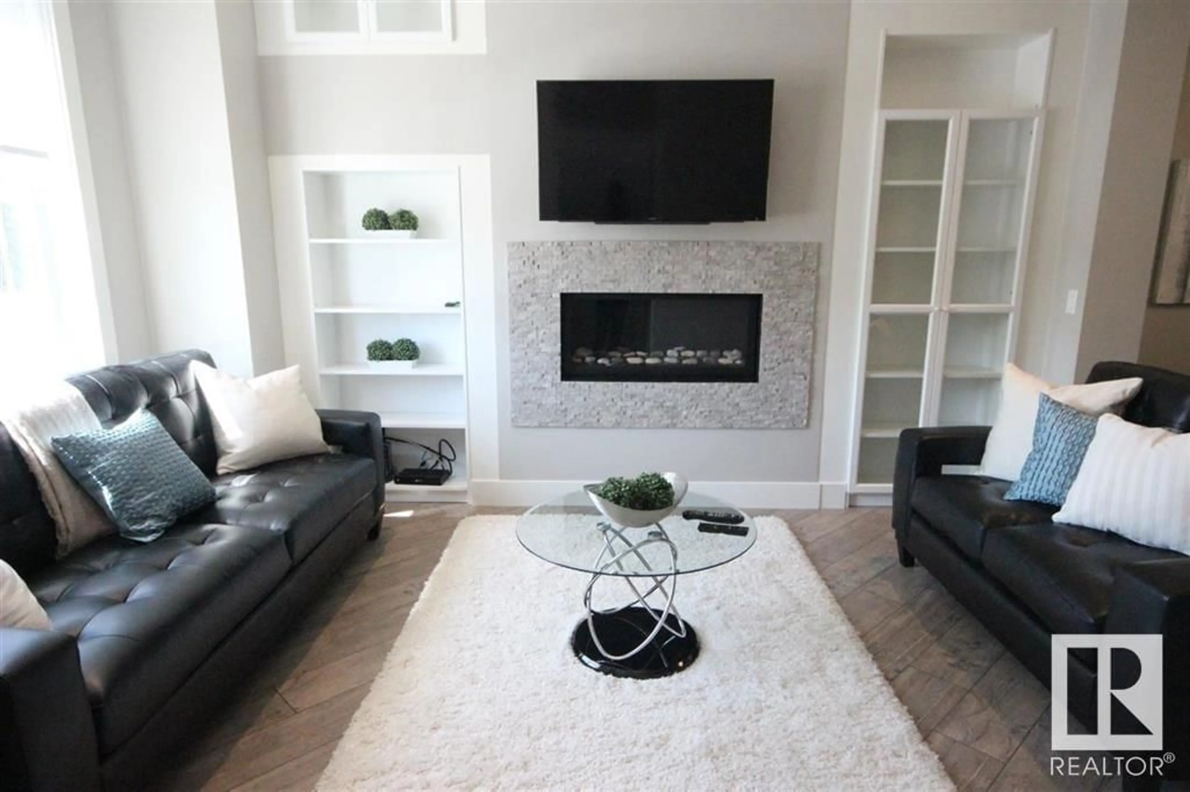 Living room with furniture, unknown for NW - 10604/06/08 61 AV, Edmonton Alberta T6H1L7