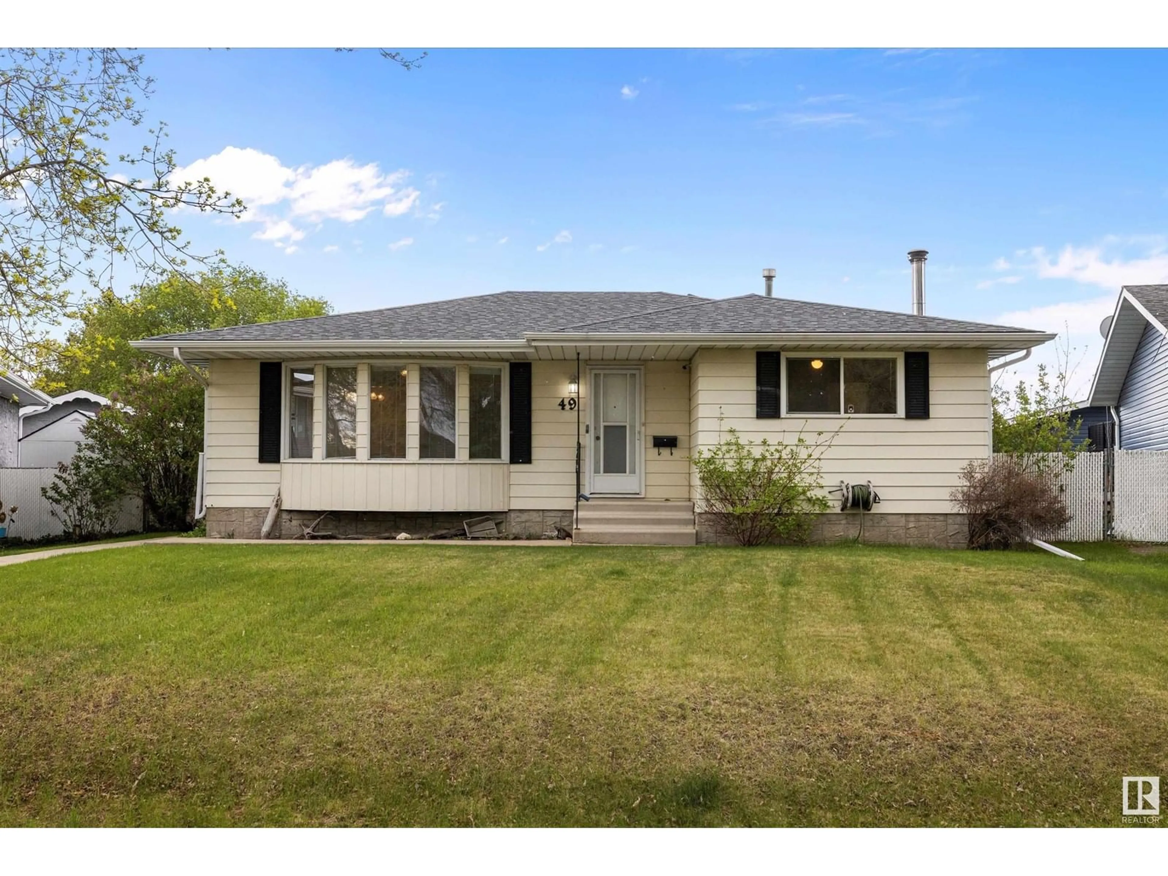 Home with vinyl exterior material, street for 49 CAMELOT CR, Leduc Alberta T9E4L2