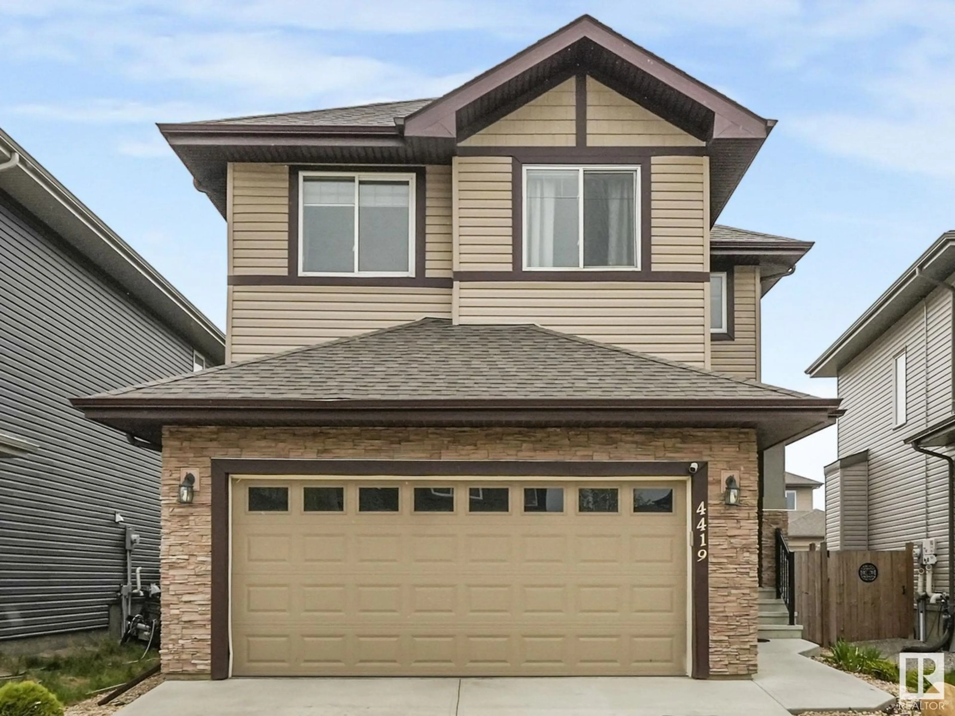 Home with vinyl exterior material, street for 4419 38A ST, Beaumont Alberta T4X2B8