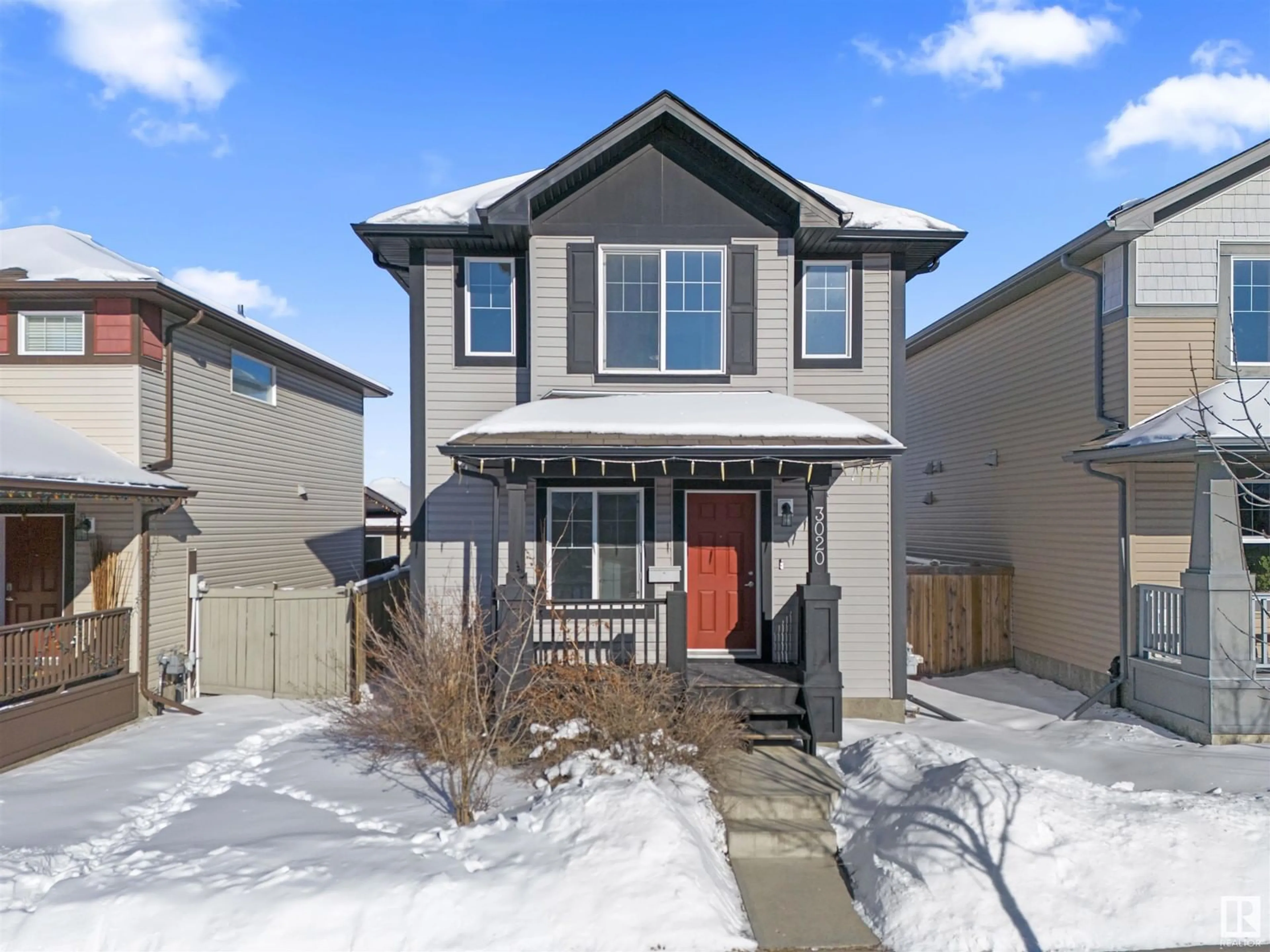 Home with vinyl exterior material, street for 3020 20 AV, Edmonton Alberta T6T0L8