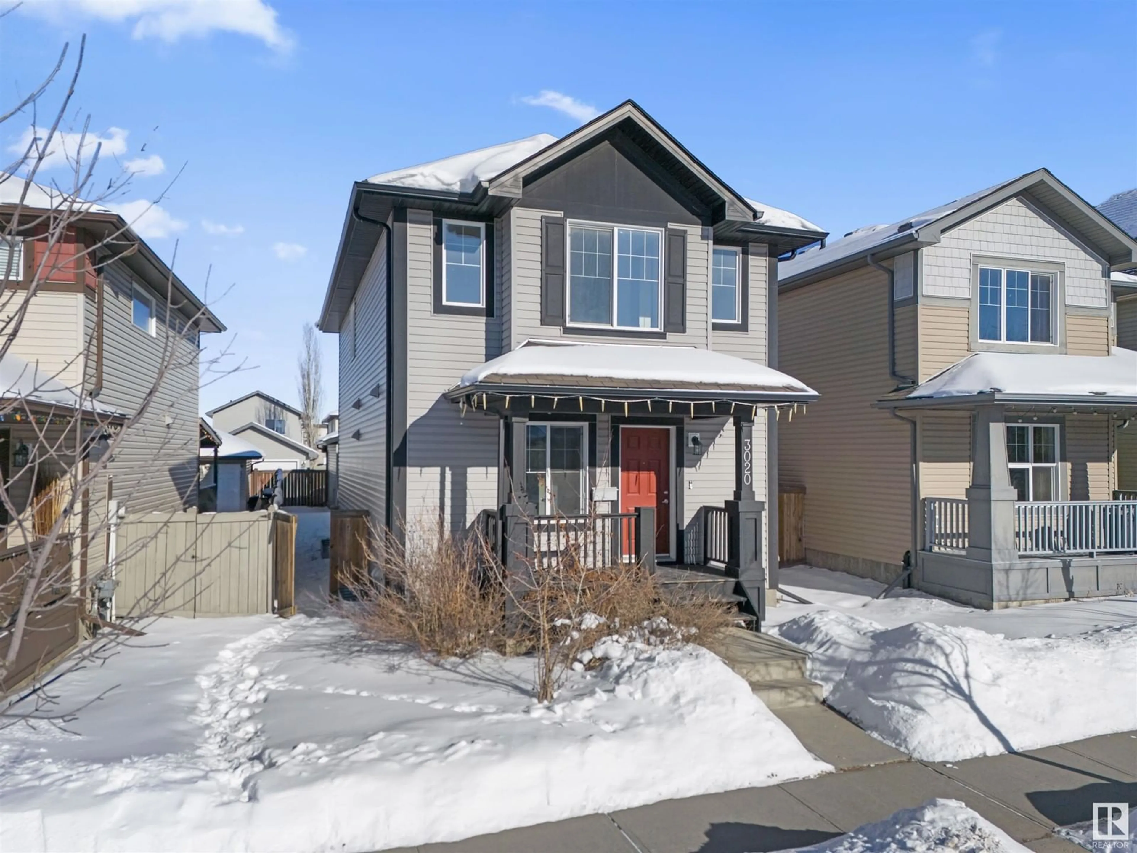 Home with vinyl exterior material, street for 3020 20 AV, Edmonton Alberta T6T0L8