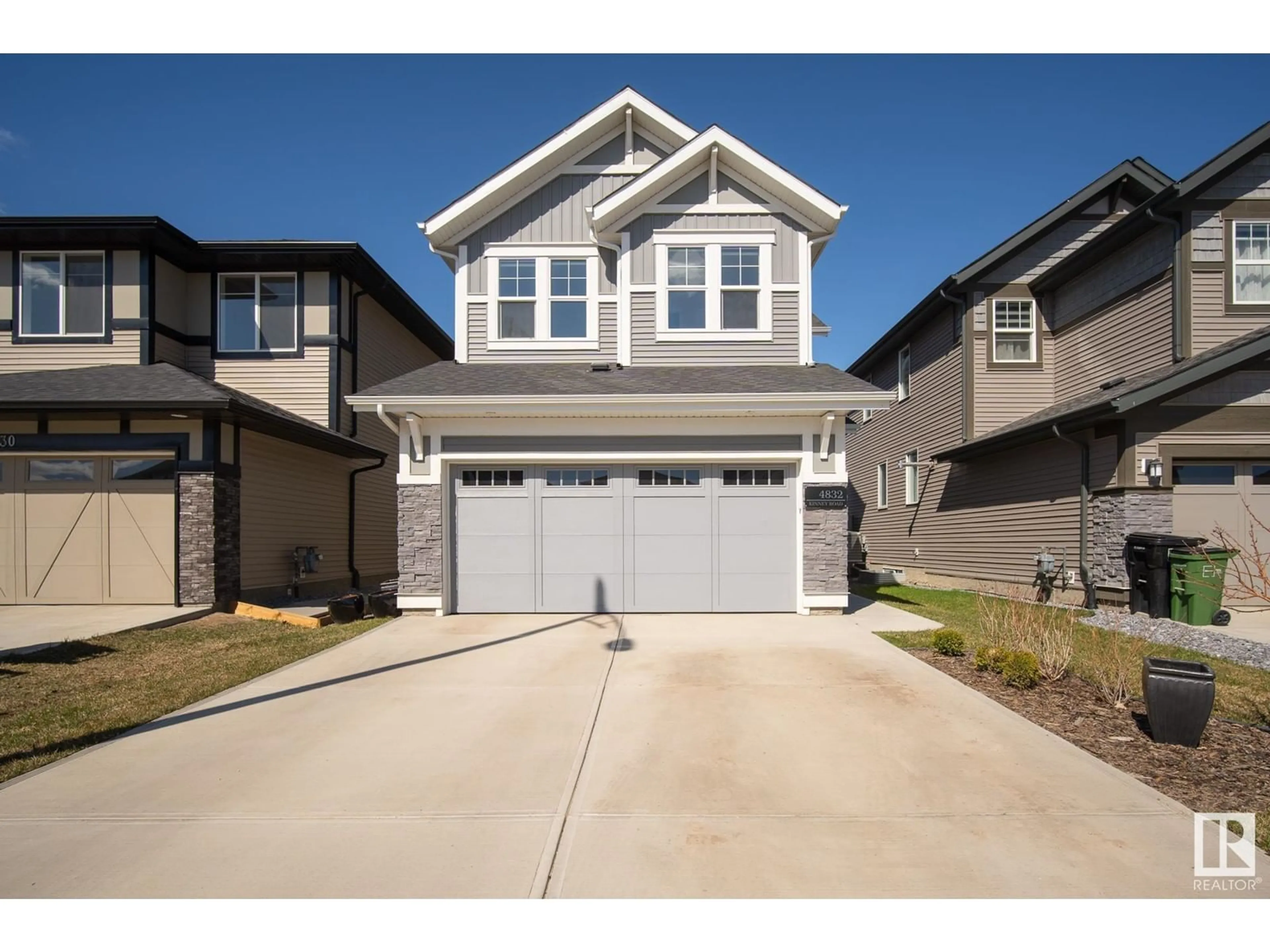 Home with vinyl exterior material, street for 4832 KINNEY RD, Edmonton Alberta T6W5G2
