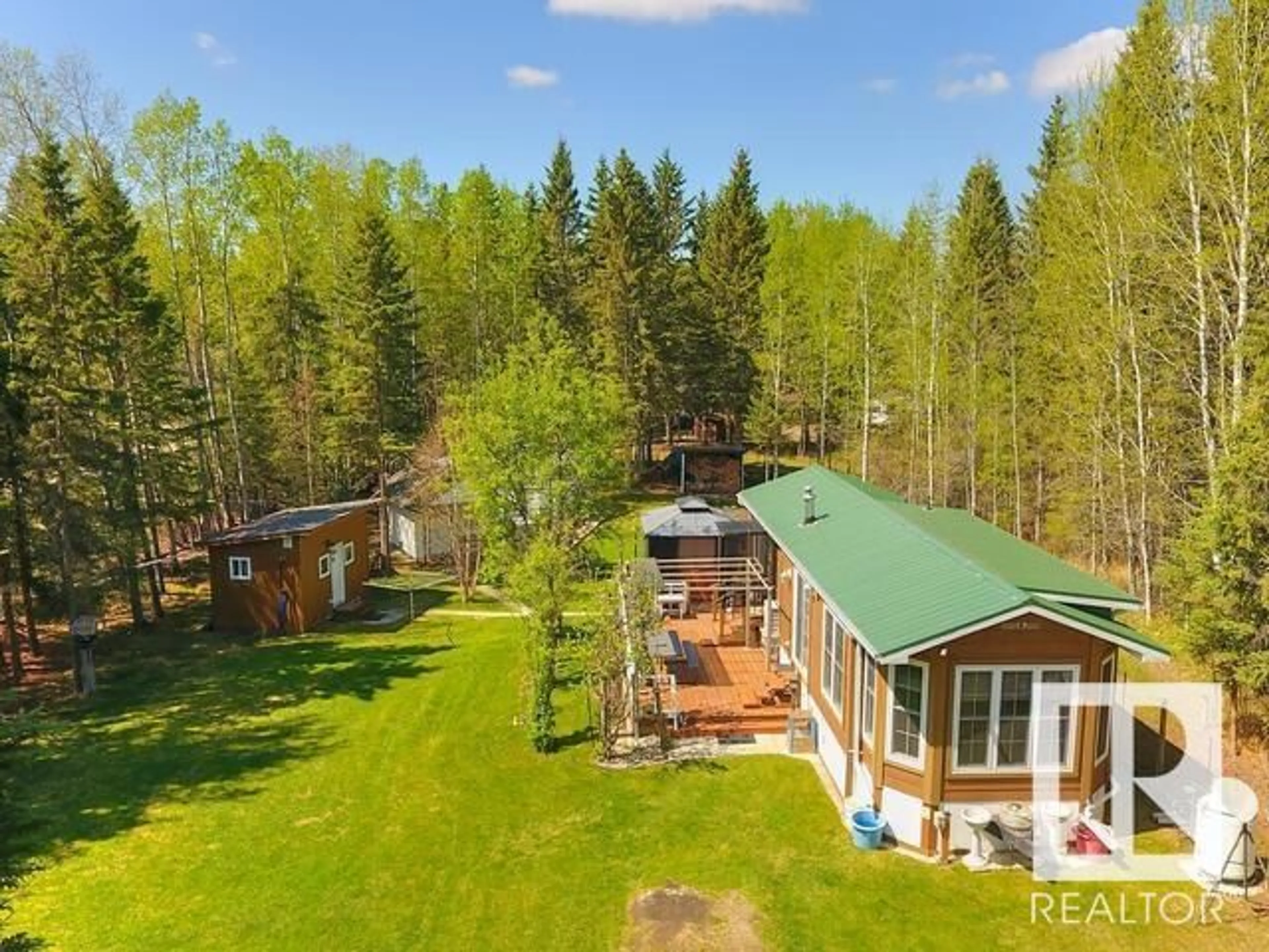 A pic from outside/outdoor area/front of a property/back of a property/a pic from drone, water/lake/river/ocean view for 200 - 4418 HWY 633, Rural Lac Ste. Anne County Alberta T0E0A0