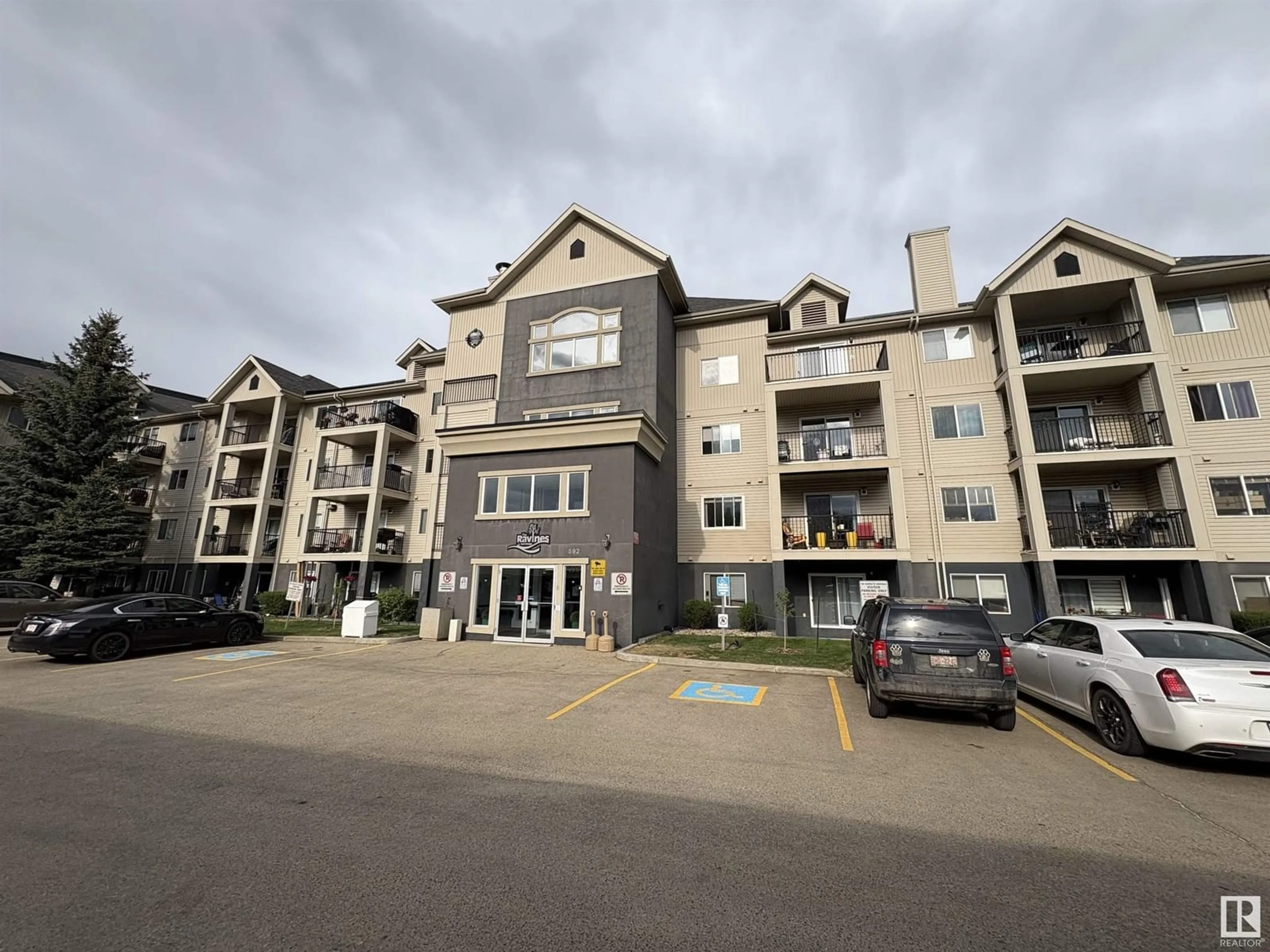 A pic from outside/outdoor area/front of a property/back of a property/a pic from drone, unknown for 404 - 592 HOOKE RD, Edmonton Alberta T5A5H2