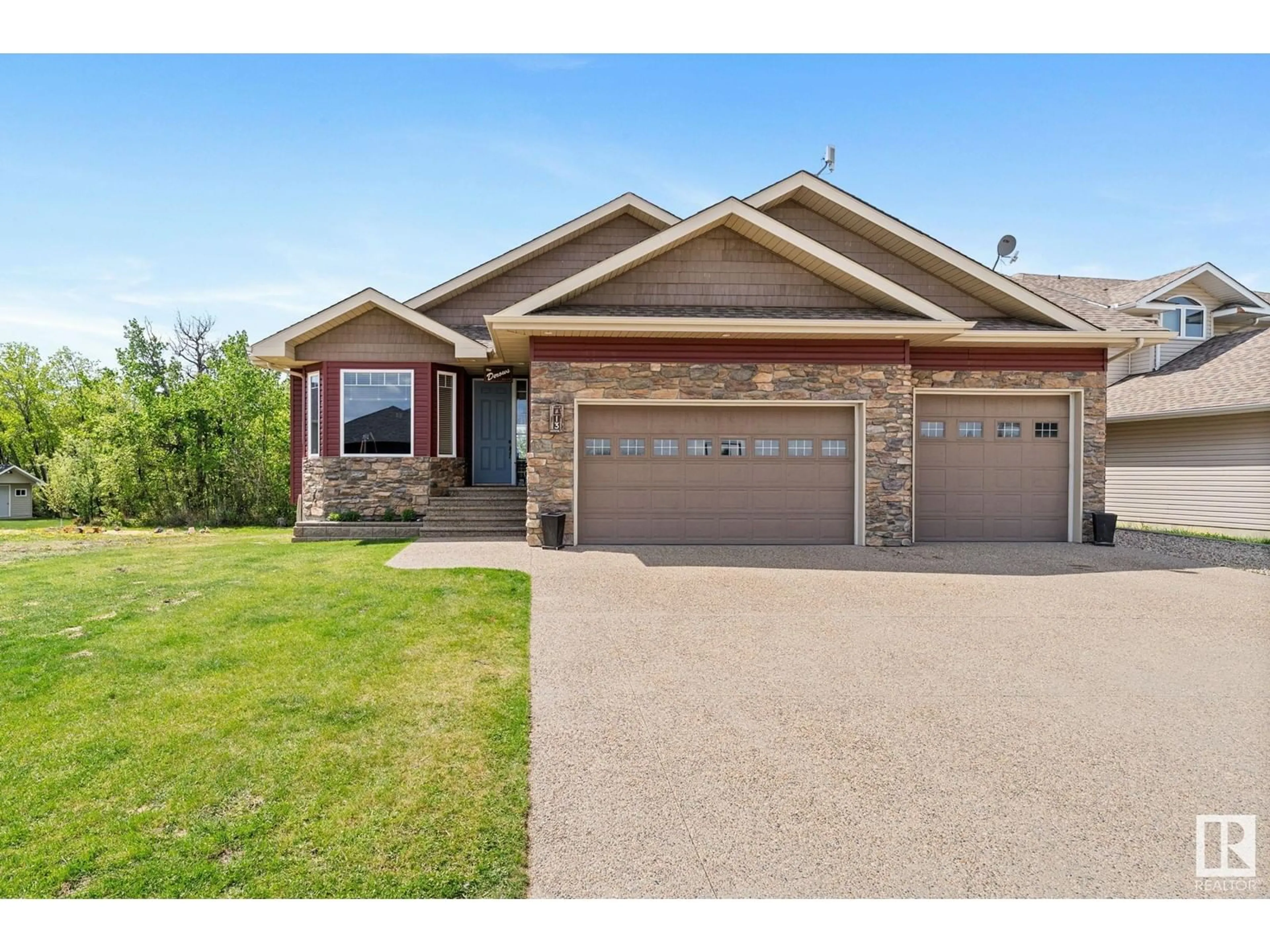 Home with brick exterior material, street for 13 WHITETAIL PT, Mundare Alberta T0B3H0