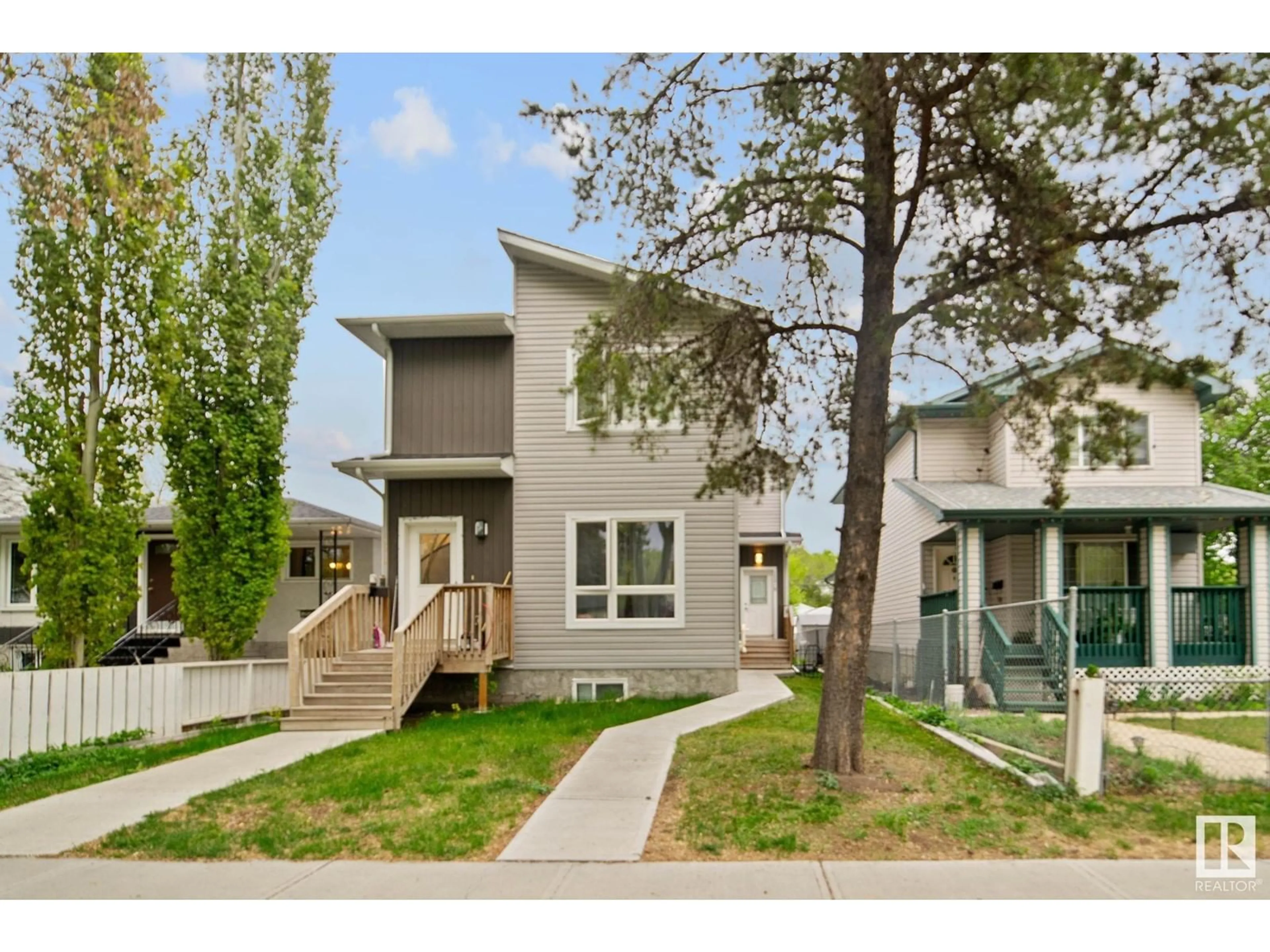 Home with vinyl exterior material, street for 12017 94 ST, Edmonton Alberta T5G1J8