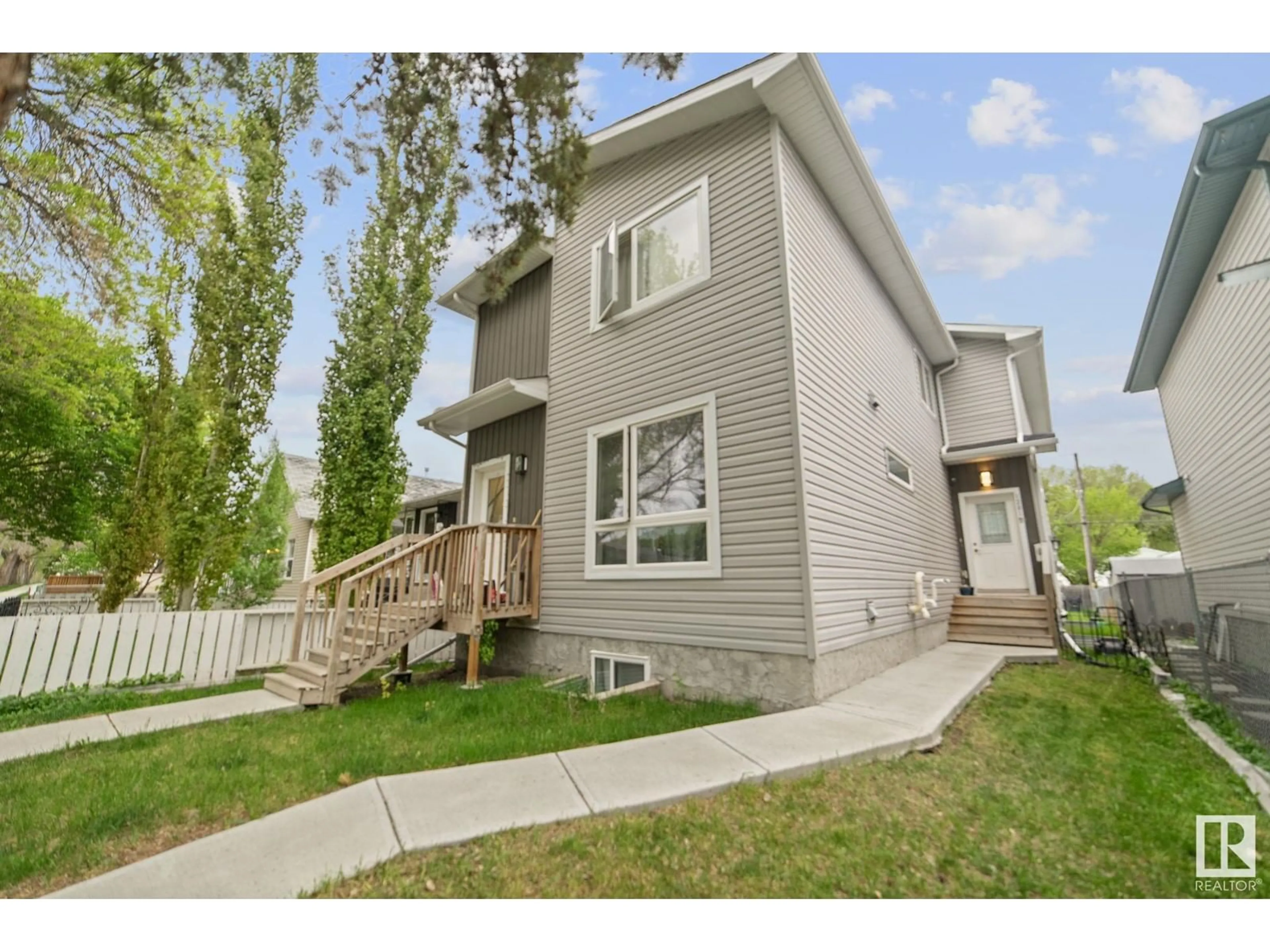Home with vinyl exterior material, street for 12017 94 ST, Edmonton Alberta T5G1J8