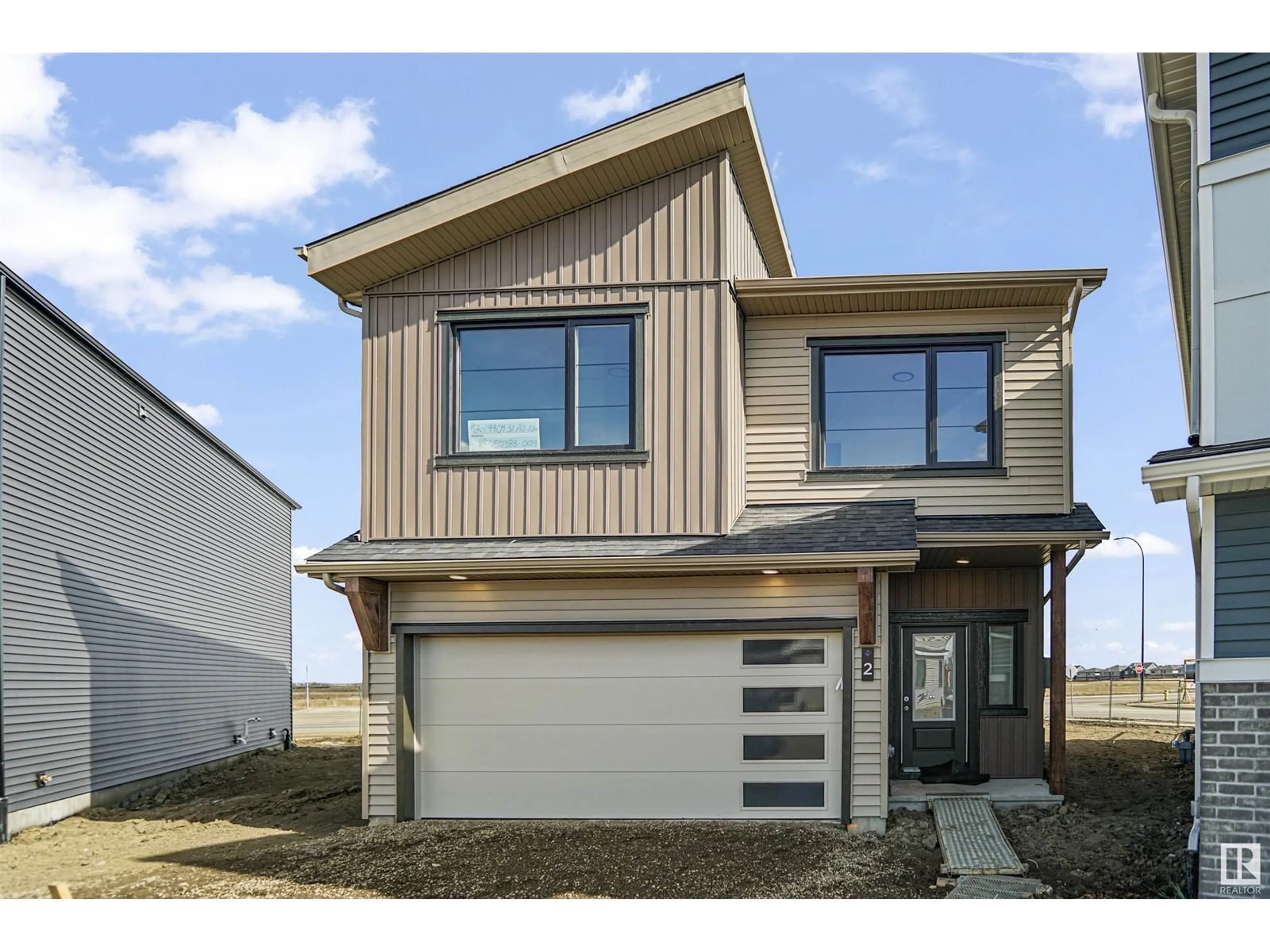Home with vinyl exterior material, street for 54 19904 31 AV NW, Edmonton Alberta T6M1N7