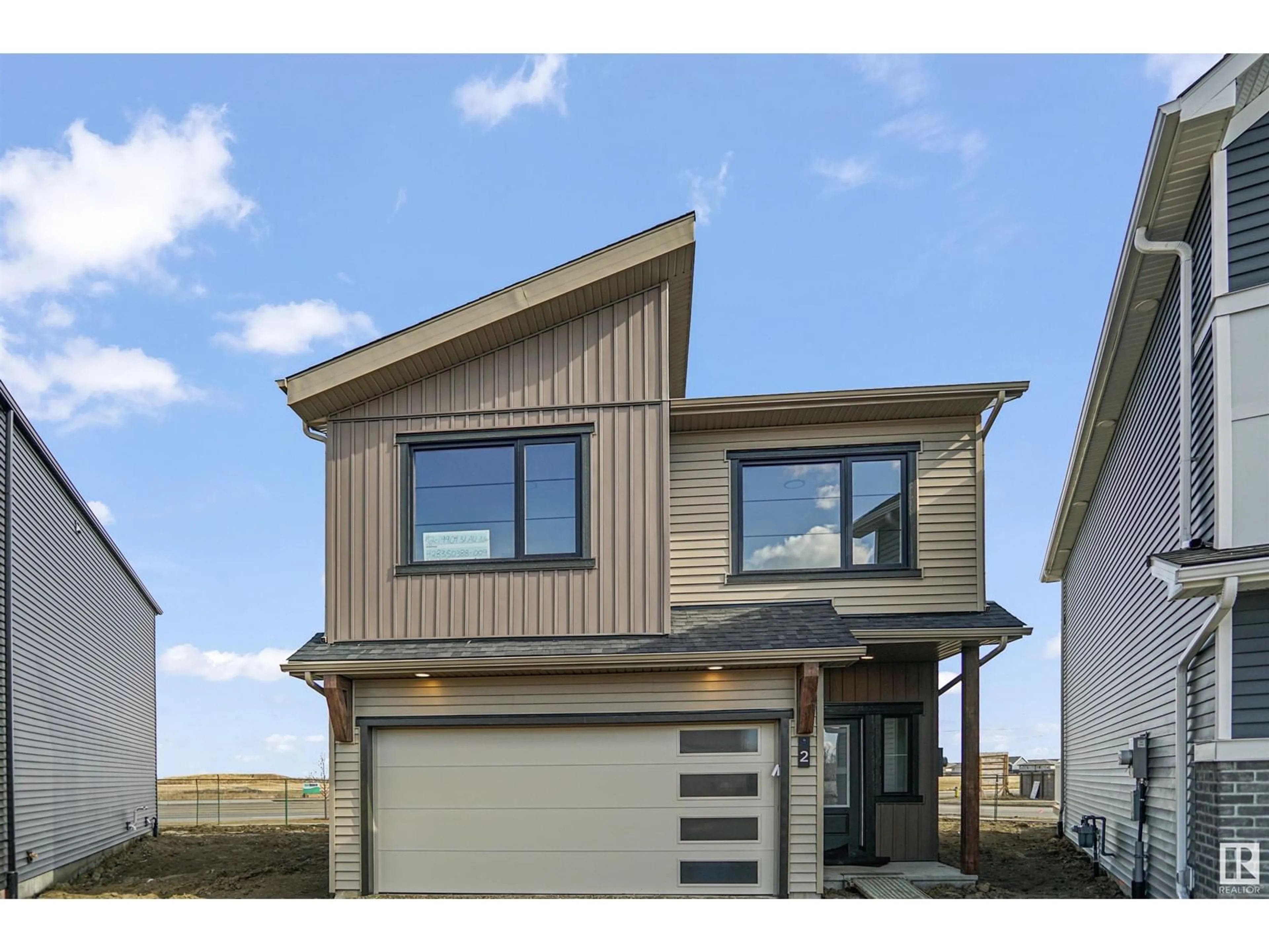 Home with vinyl exterior material, street for 54 19904 31 AV NW, Edmonton Alberta T6M1N7