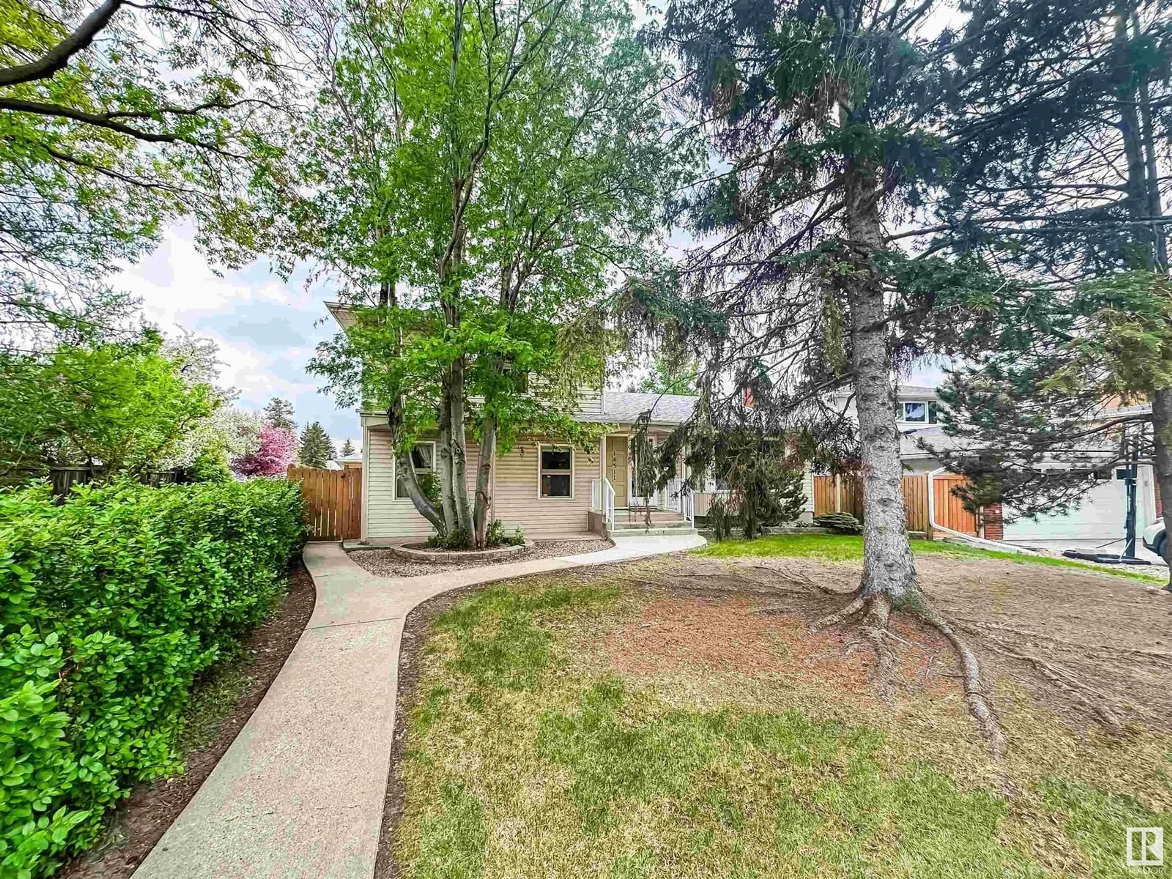 A pic from outside/outdoor area/front of a property/back of a property/a pic from drone, street for 14311 58 AV, Edmonton Alberta T6H1C9