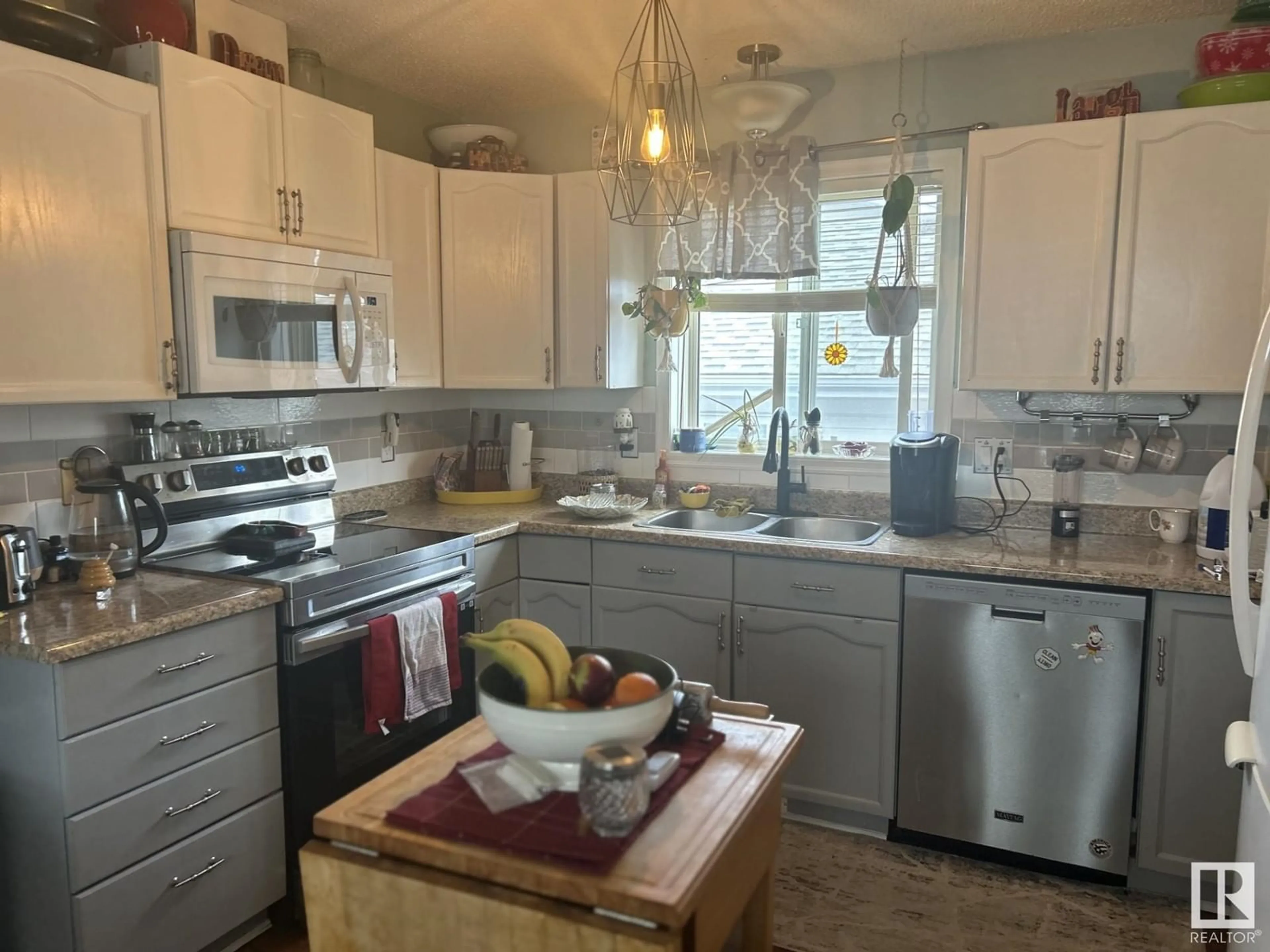 Open concept kitchen, unknown for 20 GOLD EYE DR, Devon Alberta T9G1V9